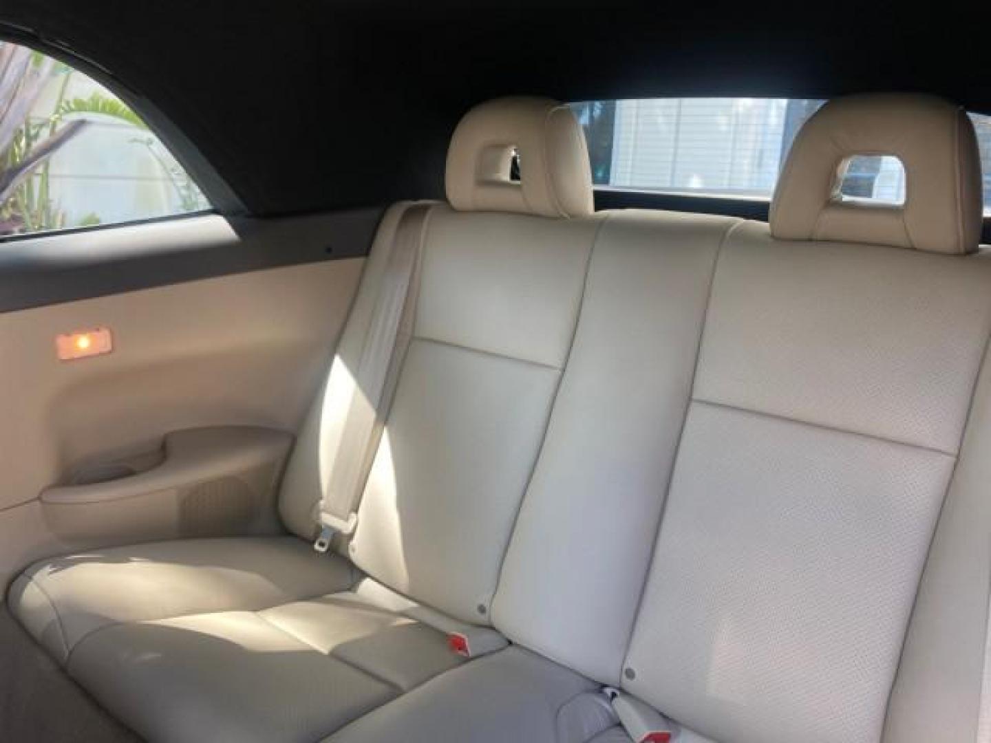 2007 Cosmic Blue Metallic /Ivory Toyota Camry Solara SLE LOW MILES 60,485 1 OWNER FL (4T1FA38P57U) with an 3.3L DOHC SMPI VVT-i 24-Valve V6 Engine engine, Automatic transmission, located at 4701 North Dixie Hwy, Pompano Beach, FL, 33064, (954) 422-2889, 26.240938, -80.123474 - OUR WEBPAGE FLORIDACARS1.COM HAS OVER 100 PHOTOS AND FREE CARFAX LINK 2007 Toyota Camry Solara SLE V6 1 OWNER FL Convertible 3.3L V6 F DOHC 24V Gasoline Front Wheel Drive Features ABS Brakes Air Conditioning Alloy Wheels AM/FM Stereo Automatic Transmission Auxiliary Audio Input Bluetooth Technology - Photo#91