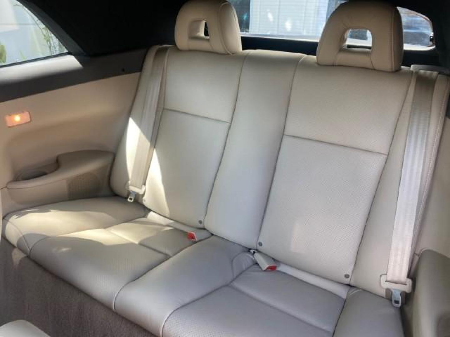 2007 Cosmic Blue Metallic /Ivory Toyota Camry Solara SLE LOW MILES 60,485 1 OWNER FL (4T1FA38P57U) with an 3.3L DOHC SMPI VVT-i 24-Valve V6 Engine engine, Automatic transmission, located at 4701 North Dixie Hwy, Pompano Beach, FL, 33064, (954) 422-2889, 26.240938, -80.123474 - OUR WEBPAGE FLORIDACARS1.COM HAS OVER 100 PHOTOS AND FREE CARFAX LINK 2007 Toyota Camry Solara SLE V6 1 OWNER FL Convertible 3.3L V6 F DOHC 24V Gasoline Front Wheel Drive Features ABS Brakes Air Conditioning Alloy Wheels AM/FM Stereo Automatic Transmission Auxiliary Audio Input Bluetooth Technology - Photo#92