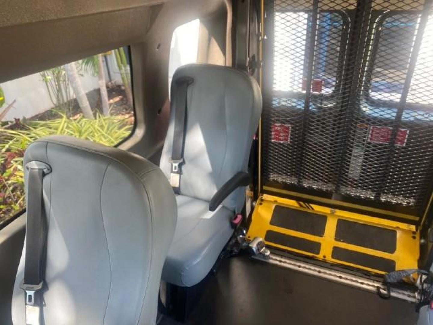 2014 Steel Blue Metallic /Medium Flint Ford Econoline E 350 HI TOP HANDICAP VAN LOW MILES 34,875 1 OWNER (1FTSS3ELXED) with an 5.4L EFI V8 FFV Capable Engine engine, Automatic transmission, located at 4701 North Dixie Hwy, Pompano Beach, FL, 33064, (954) 422-2889, 26.240938, -80.123474 - OUR WEBPAGE FLORIDACARS1.COM HAS OVER 100 PHOTOS AND FREE CARFAX LINK 2014 FORD E-SERIES E-350 SD VIN: 1FTSS3ELXEDA55644 1 F T S S 3 E L X E D A 5 5 6 4 4 VAN 5.4L V8 F SOHC 16V GASOLINE 16 MPG REAR WHEEL DRIVE Features ABS Brakes Air Conditioning Alloy Wheels AM/FM Stereo Automatic Transmission Cru - Photo#90