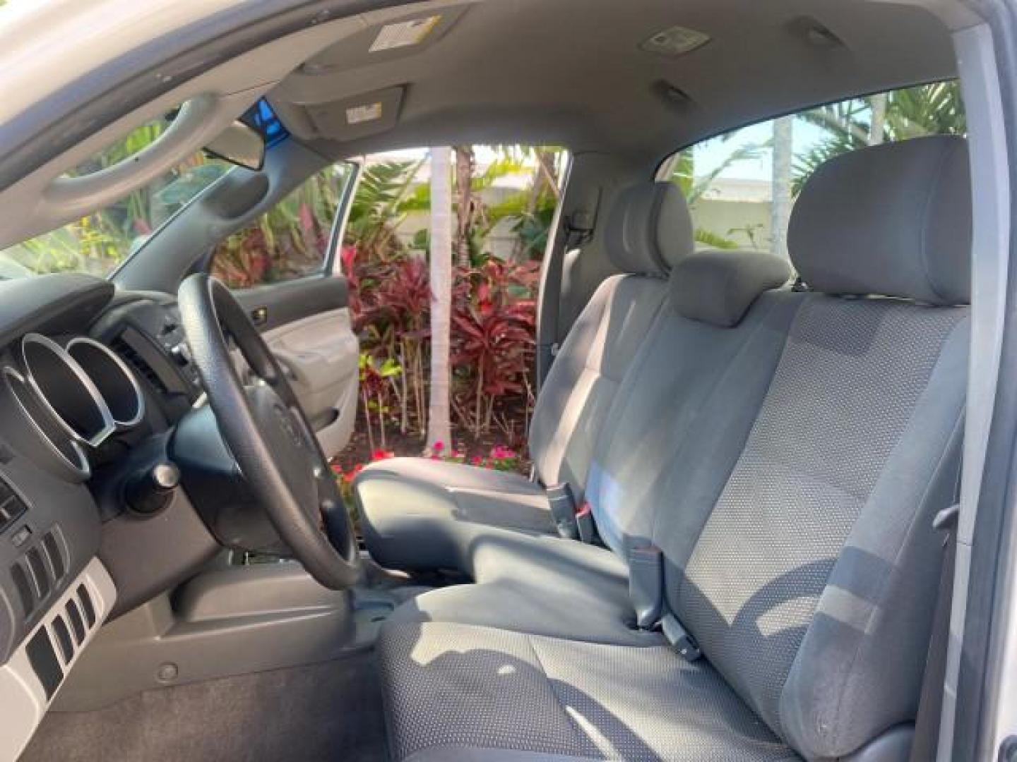 2007 Super White /Gray Toyota Tacoma LOW MILES 98,053 AUTO AC 4 CYL (5TENX22N77Z) with an 2.7L DOHC EFI 16-Valve I4 VVT-i Engine engine, Automatic transmission, located at 4701 North Dixie Hwy, Pompano Beach, FL, 33064, (954) 422-2889, 26.240938, -80.123474 - OUR WEBPAGE FLORIDACARS1.COM HAS OVER 100 PHOTOS AND FREE CARFAX LINK 2007 Toyota Tacoma VIN: 5TENX22N77Z369647 Pickup 2.7L I4 F DOHC 16V Gasoline 28 MPG Rear Wheel Drive Features ABS Brakes Air Conditioning AM/FM Stereo Automatic Transmission CD Audio Cloth Seats Cruise Control This incredible 2-ow- Photo#10