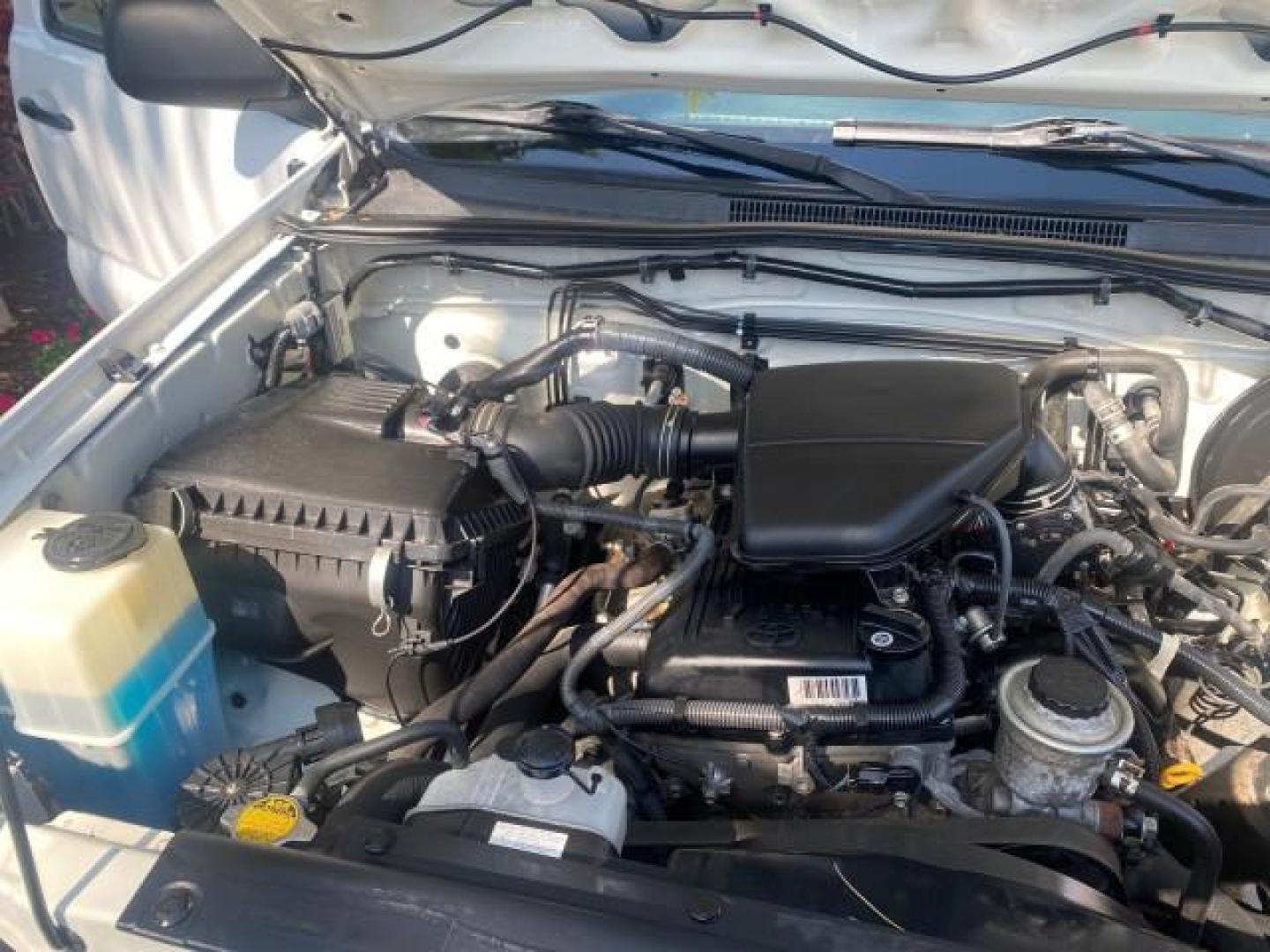 2007 Super White /Gray Toyota Tacoma LOW MILES 98,053 AUTO AC 4 CYL (5TENX22N77Z) with an 2.7L DOHC EFI 16-Valve I4 VVT-i Engine engine, Automatic transmission, located at 4701 North Dixie Hwy, Pompano Beach, FL, 33064, (954) 422-2889, 26.240938, -80.123474 - OUR WEBPAGE FLORIDACARS1.COM HAS OVER 100 PHOTOS AND FREE CARFAX LINK 2007 Toyota Tacoma VIN: 5TENX22N77Z369647 Pickup 2.7L I4 F DOHC 16V Gasoline 28 MPG Rear Wheel Drive Features ABS Brakes Air Conditioning AM/FM Stereo Automatic Transmission CD Audio Cloth Seats Cruise Control This incredible 2-ow- Photo#24