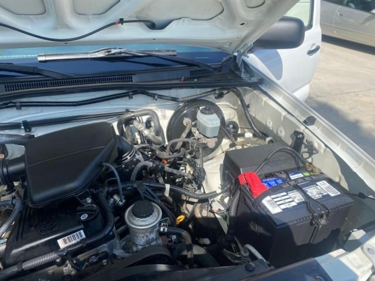 2007 Super White /Gray Toyota Tacoma LOW MILES 98,053 AUTO AC 4 CYL (5TENX22N77Z) with an 2.7L DOHC EFI 16-Valve I4 VVT-i Engine engine, Automatic transmission, located at 4701 North Dixie Hwy, Pompano Beach, FL, 33064, (954) 422-2889, 26.240938, -80.123474 - OUR WEBPAGE FLORIDACARS1.COM HAS OVER 100 PHOTOS AND FREE CARFAX LINK 2007 Toyota Tacoma VIN: 5TENX22N77Z369647 Pickup 2.7L I4 F DOHC 16V Gasoline 28 MPG Rear Wheel Drive Features ABS Brakes Air Conditioning AM/FM Stereo Automatic Transmission CD Audio Cloth Seats Cruise Control This incredible 2-ow- Photo#25