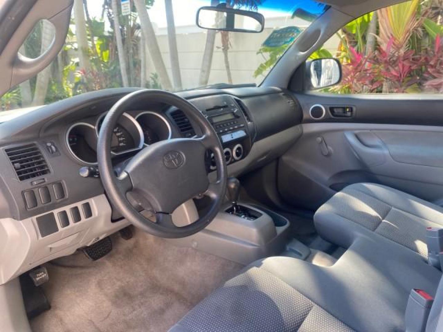 2007 Super White /Gray Toyota Tacoma LOW MILES 98,053 AUTO AC 4 CYL (5TENX22N77Z) with an 2.7L DOHC EFI 16-Valve I4 VVT-i Engine engine, Automatic transmission, located at 4701 North Dixie Hwy, Pompano Beach, FL, 33064, (954) 422-2889, 26.240938, -80.123474 - OUR WEBPAGE FLORIDACARS1.COM HAS OVER 100 PHOTOS AND FREE CARFAX LINK 2007 Toyota Tacoma VIN: 5TENX22N77Z369647 Pickup 2.7L I4 F DOHC 16V Gasoline 28 MPG Rear Wheel Drive Features ABS Brakes Air Conditioning AM/FM Stereo Automatic Transmission CD Audio Cloth Seats Cruise Control This incredible 2-ow- Photo#48
