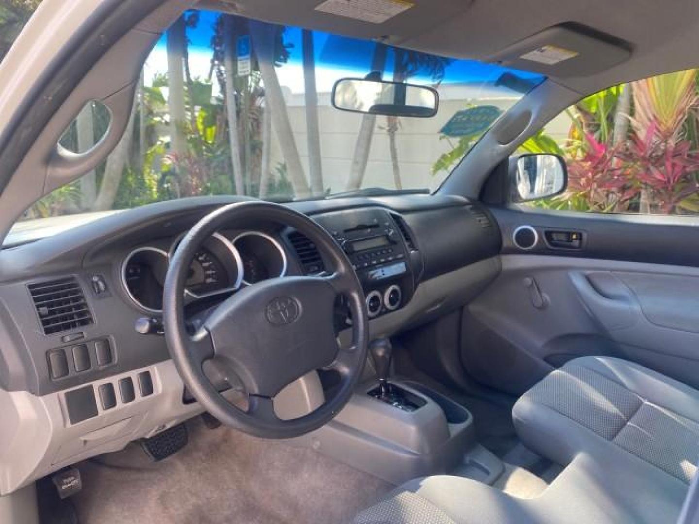 2007 Super White /Gray Toyota Tacoma LOW MILES 98,053 AUTO AC 4 CYL (5TENX22N77Z) with an 2.7L DOHC EFI 16-Valve I4 VVT-i Engine engine, Automatic transmission, located at 4701 North Dixie Hwy, Pompano Beach, FL, 33064, (954) 422-2889, 26.240938, -80.123474 - OUR WEBPAGE FLORIDACARS1.COM HAS OVER 100 PHOTOS AND FREE CARFAX LINK 2007 Toyota Tacoma VIN: 5TENX22N77Z369647 Pickup 2.7L I4 F DOHC 16V Gasoline 28 MPG Rear Wheel Drive Features ABS Brakes Air Conditioning AM/FM Stereo Automatic Transmission CD Audio Cloth Seats Cruise Control This incredible 2-ow- Photo#49