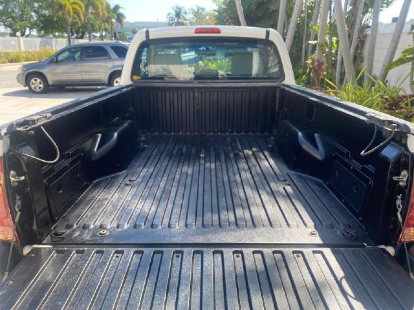 2007 Super White /Gray Toyota Tacoma LOW MILES 98,053 AUTO AC 4 CYL (5TENX22N77Z) with an 2.7L DOHC EFI 16-Valve I4 VVT-i Engine engine, Automatic transmission, located at 4701 North Dixie Hwy, Pompano Beach, FL, 33064, (954) 422-2889, 26.240938, -80.123474 - OUR WEBPAGE FLORIDACARS1.COM HAS OVER 100 PHOTOS AND FREE CARFAX LINK 2007 Toyota Tacoma VIN: 5TENX22N77Z369647 Pickup 2.7L I4 F DOHC 16V Gasoline 28 MPG Rear Wheel Drive Features ABS Brakes Air Conditioning AM/FM Stereo Automatic Transmission CD Audio Cloth Seats Cruise Control This incredible 2-ow- Photo#87