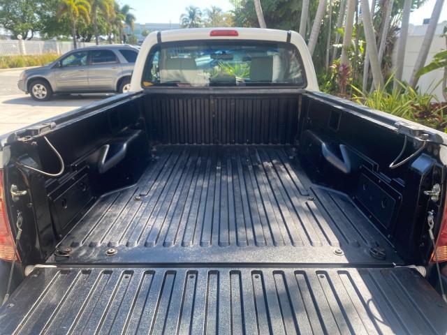 2007 Super White /Gray Toyota Tacoma LOW MILES 98,053 AUTO AC 4 CYL (5TENX22N77Z) with an 2.7L DOHC EFI 16-Valve I4 VVT-i Engine engine, Automatic transmission, located at 4701 North Dixie Hwy, Pompano Beach, FL, 33064, (954) 422-2889, 26.240938, -80.123474 - OUR WEBPAGE FLORIDACARS1.COM HAS OVER 100 PHOTOS AND FREE CARFAX LINK 2007 Toyota Tacoma VIN: 5TENX22N77Z369647 Pickup 2.7L I4 F DOHC 16V Gasoline 28 MPG Rear Wheel Drive Features ABS Brakes Air Conditioning AM/FM Stereo Automatic Transmission CD Audio Cloth Seats Cruise Control This incredible 2-ow - Photo#87