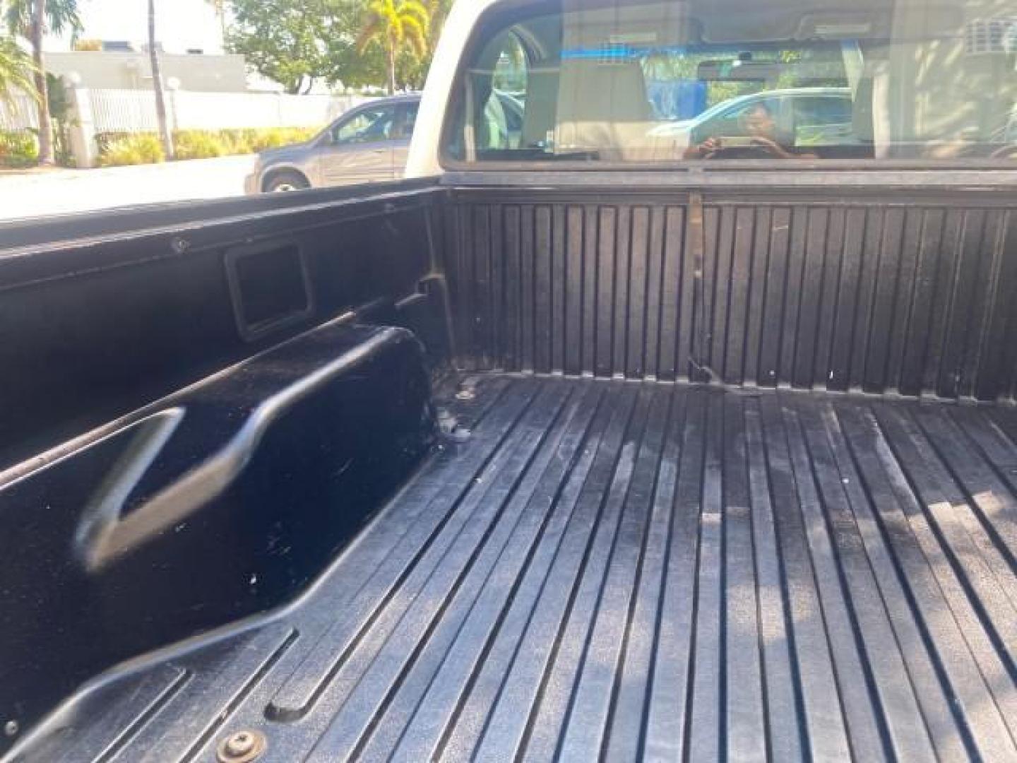 2007 Super White /Gray Toyota Tacoma LOW MILES 98,053 AUTO AC 4 CYL (5TENX22N77Z) with an 2.7L DOHC EFI 16-Valve I4 VVT-i Engine engine, Automatic transmission, located at 4701 North Dixie Hwy, Pompano Beach, FL, 33064, (954) 422-2889, 26.240938, -80.123474 - OUR WEBPAGE FLORIDACARS1.COM HAS OVER 100 PHOTOS AND FREE CARFAX LINK 2007 Toyota Tacoma VIN: 5TENX22N77Z369647 Pickup 2.7L I4 F DOHC 16V Gasoline 28 MPG Rear Wheel Drive Features ABS Brakes Air Conditioning AM/FM Stereo Automatic Transmission CD Audio Cloth Seats Cruise Control This incredible 2-ow- Photo#90