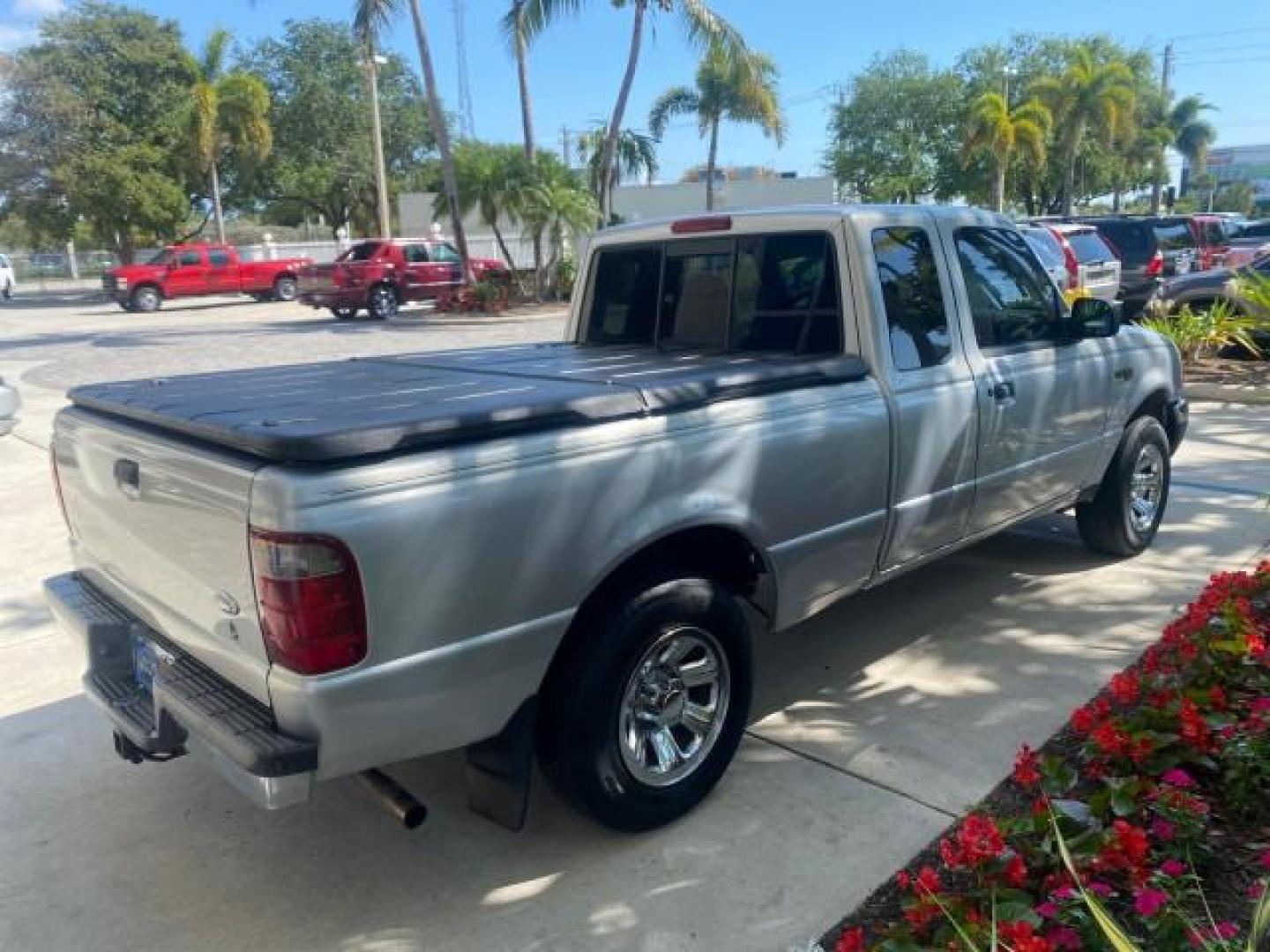 2003 Silver Frost Metallic /Dark Graphite Ford Ranger Edge Plus LOW MILES 57,781 X CAB (1FTYR44V93P) with an 3.0L SEFI Flex-Fuel FFV V6 Engine engine, Automatic transmission, located at 4701 North Dixie Hwy, Pompano Beach, FL, 33064, (954) 422-2889, 26.240938, -80.123474 - OUR WEBPAGE FLORIDACARS1.COM HAS OVER 100 PHOTOS AND FREE CARFAX LINK 2003 Ford Ranger XLT 4 Door Extended Cab Pickup 3.0L V6 F Flex Fuel 23 MPG Rear Wheel Drive Features ABS Brakes Air Conditioning Alloy Wheels AM/FM Stereo Automatic Transmission Bed Liner CD Audio Cloth Seats Cruise Control Flex F - Photo#7