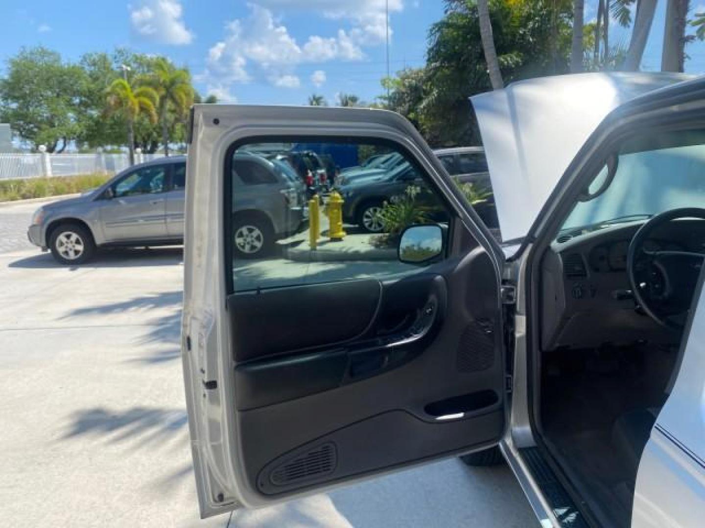 2003 Silver Frost Metallic /Dark Graphite Ford Ranger Edge Plus LOW MILES 57,781 X CAB (1FTYR44V93P) with an 3.0L SEFI Flex-Fuel FFV V6 Engine engine, Automatic transmission, located at 4701 North Dixie Hwy, Pompano Beach, FL, 33064, (954) 422-2889, 26.240938, -80.123474 - OUR WEBPAGE FLORIDACARS1.COM HAS OVER 100 PHOTOS AND FREE CARFAX LINK 2003 Ford Ranger XLT 4 Door Extended Cab Pickup 3.0L V6 F Flex Fuel 23 MPG Rear Wheel Drive Features ABS Brakes Air Conditioning Alloy Wheels AM/FM Stereo Automatic Transmission Bed Liner CD Audio Cloth Seats Cruise Control Flex F - Photo#9