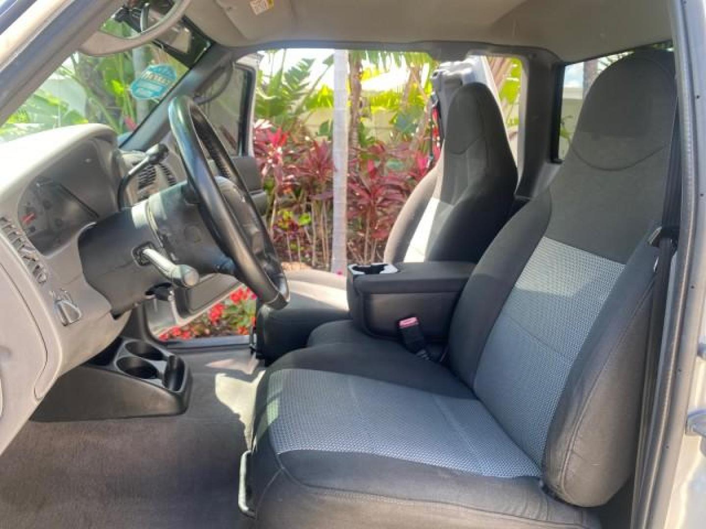 2003 Silver Frost Metallic /Dark Graphite Ford Ranger Edge Plus LOW MILES 57,781 X CAB (1FTYR44V93P) with an 3.0L SEFI Flex-Fuel FFV V6 Engine engine, Automatic transmission, located at 4701 North Dixie Hwy, Pompano Beach, FL, 33064, (954) 422-2889, 26.240938, -80.123474 - OUR WEBPAGE FLORIDACARS1.COM HAS OVER 100 PHOTOS AND FREE CARFAX LINK 2003 Ford Ranger XLT 4 Door Extended Cab Pickup 3.0L V6 F Flex Fuel 23 MPG Rear Wheel Drive Features ABS Brakes Air Conditioning Alloy Wheels AM/FM Stereo Automatic Transmission Bed Liner CD Audio Cloth Seats Cruise Control Flex F - Photo#10