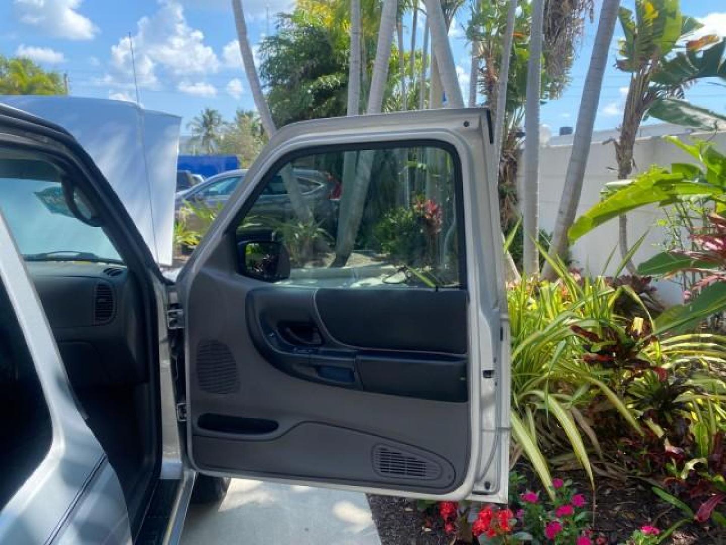 2003 Silver Frost Metallic /Dark Graphite Ford Ranger Edge Plus LOW MILES 57,781 X CAB (1FTYR44V93P) with an 3.0L SEFI Flex-Fuel FFV V6 Engine engine, Automatic transmission, located at 4701 North Dixie Hwy, Pompano Beach, FL, 33064, (954) 422-2889, 26.240938, -80.123474 - OUR WEBPAGE FLORIDACARS1.COM HAS OVER 100 PHOTOS AND FREE CARFAX LINK 2003 Ford Ranger XLT 4 Door Extended Cab Pickup 3.0L V6 F Flex Fuel 23 MPG Rear Wheel Drive Features ABS Brakes Air Conditioning Alloy Wheels AM/FM Stereo Automatic Transmission Bed Liner CD Audio Cloth Seats Cruise Control Flex F - Photo#11