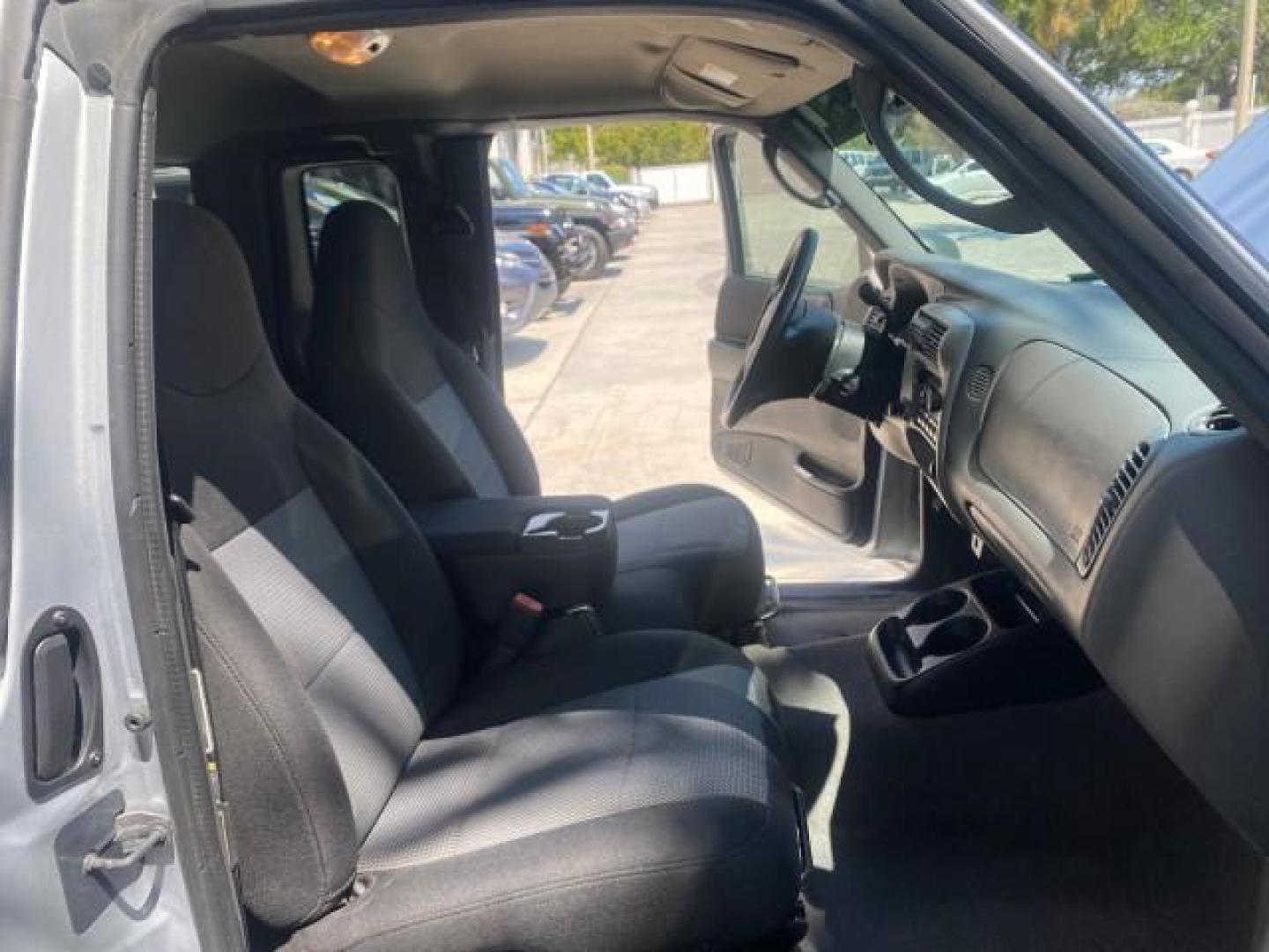 2003 Silver Frost Metallic /Dark Graphite Ford Ranger Edge Plus LOW MILES 57,781 X CAB (1FTYR44V93P) with an 3.0L SEFI Flex-Fuel FFV V6 Engine engine, Automatic transmission, located at 4701 North Dixie Hwy, Pompano Beach, FL, 33064, (954) 422-2889, 26.240938, -80.123474 - OUR WEBPAGE FLORIDACARS1.COM HAS OVER 100 PHOTOS AND FREE CARFAX LINK 2003 Ford Ranger XLT 4 Door Extended Cab Pickup 3.0L V6 F Flex Fuel 23 MPG Rear Wheel Drive Features ABS Brakes Air Conditioning Alloy Wheels AM/FM Stereo Automatic Transmission Bed Liner CD Audio Cloth Seats Cruise Control Flex F - Photo#12