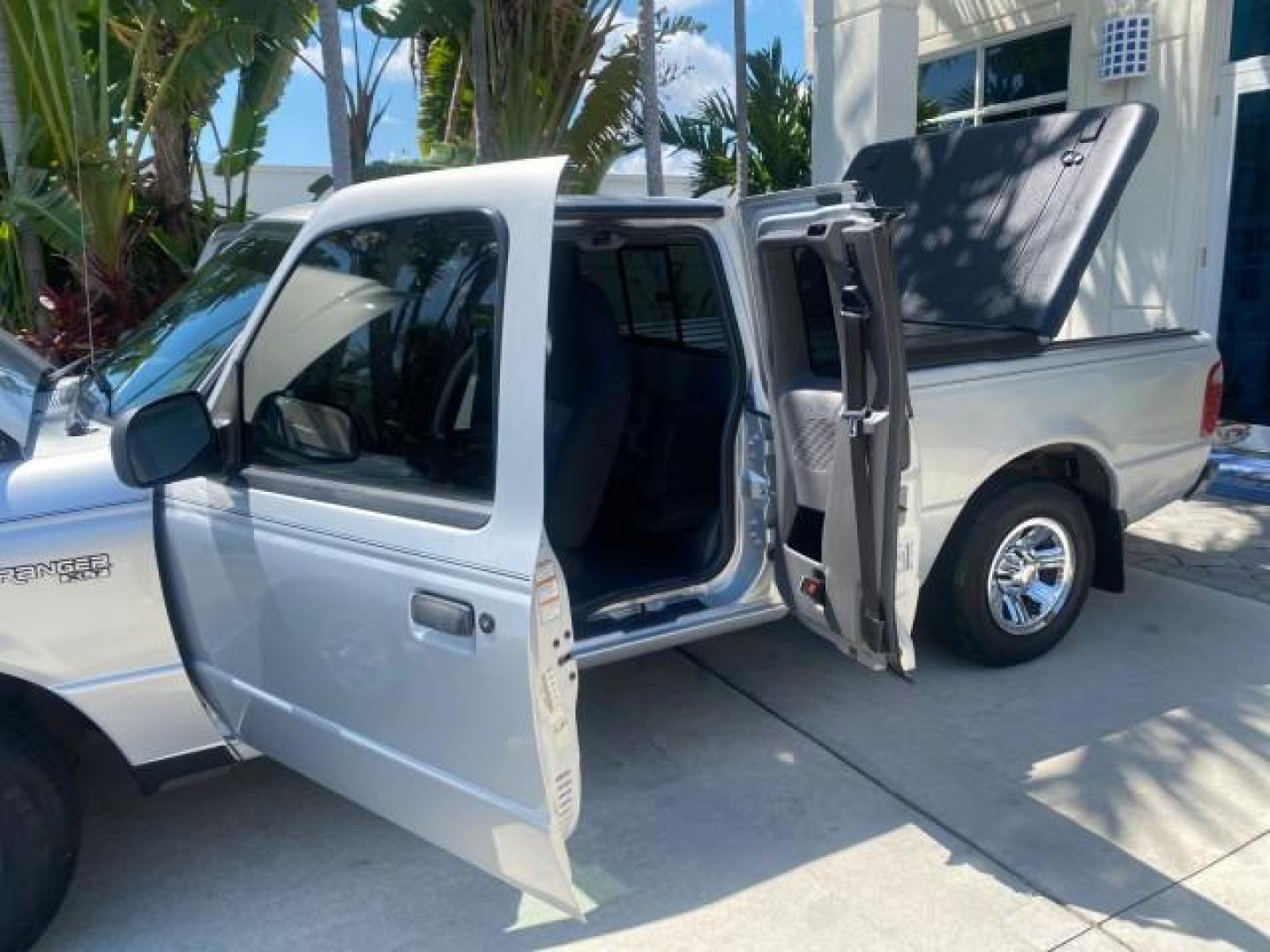 2003 Silver Frost Metallic /Dark Graphite Ford Ranger Edge Plus LOW MILES 57,781 X CAB (1FTYR44V93P) with an 3.0L SEFI Flex-Fuel FFV V6 Engine engine, Automatic transmission, located at 4701 North Dixie Hwy, Pompano Beach, FL, 33064, (954) 422-2889, 26.240938, -80.123474 - OUR WEBPAGE FLORIDACARS1.COM HAS OVER 100 PHOTOS AND FREE CARFAX LINK 2003 Ford Ranger XLT 4 Door Extended Cab Pickup 3.0L V6 F Flex Fuel 23 MPG Rear Wheel Drive Features ABS Brakes Air Conditioning Alloy Wheels AM/FM Stereo Automatic Transmission Bed Liner CD Audio Cloth Seats Cruise Control Flex F - Photo#13