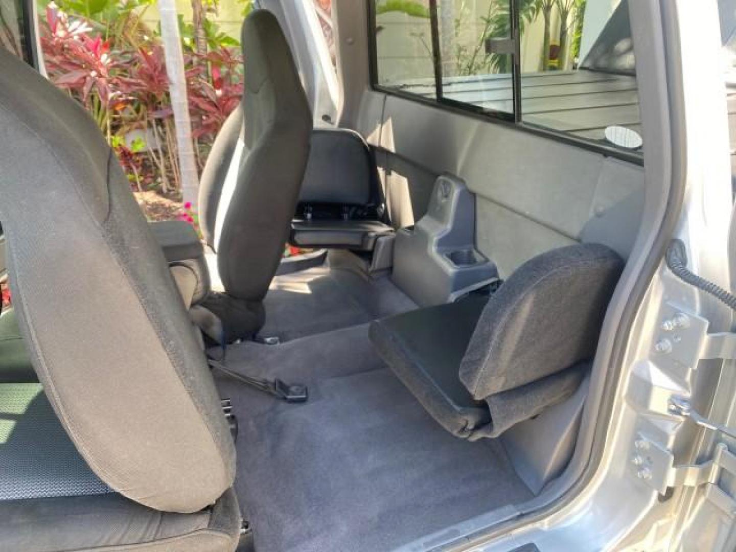 2003 Silver Frost Metallic /Dark Graphite Ford Ranger Edge Plus LOW MILES 57,781 X CAB (1FTYR44V93P) with an 3.0L SEFI Flex-Fuel FFV V6 Engine engine, Automatic transmission, located at 4701 North Dixie Hwy, Pompano Beach, FL, 33064, (954) 422-2889, 26.240938, -80.123474 - OUR WEBPAGE FLORIDACARS1.COM HAS OVER 100 PHOTOS AND FREE CARFAX LINK 2003 Ford Ranger XLT 4 Door Extended Cab Pickup 3.0L V6 F Flex Fuel 23 MPG Rear Wheel Drive Features ABS Brakes Air Conditioning Alloy Wheels AM/FM Stereo Automatic Transmission Bed Liner CD Audio Cloth Seats Cruise Control Flex F - Photo#14