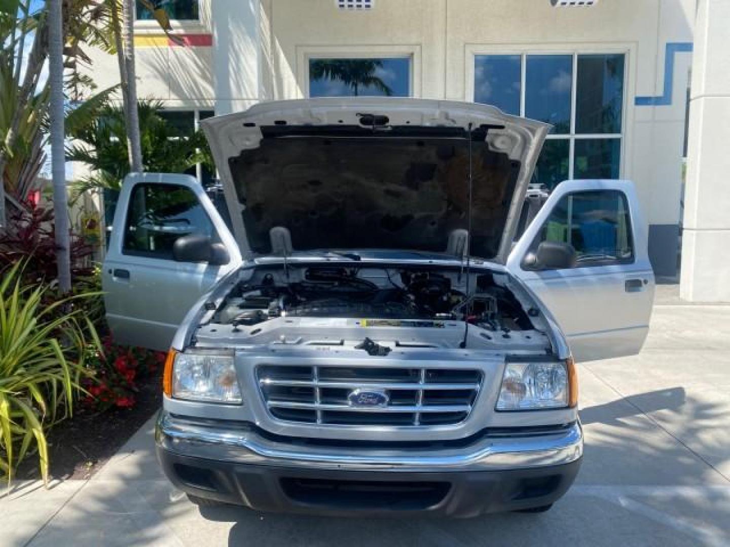 2003 Silver Frost Metallic /Dark Graphite Ford Ranger Edge Plus LOW MILES 57,781 X CAB (1FTYR44V93P) with an 3.0L SEFI Flex-Fuel FFV V6 Engine engine, Automatic transmission, located at 4701 North Dixie Hwy, Pompano Beach, FL, 33064, (954) 422-2889, 26.240938, -80.123474 - OUR WEBPAGE FLORIDACARS1.COM HAS OVER 100 PHOTOS AND FREE CARFAX LINK 2003 Ford Ranger XLT 4 Door Extended Cab Pickup 3.0L V6 F Flex Fuel 23 MPG Rear Wheel Drive Features ABS Brakes Air Conditioning Alloy Wheels AM/FM Stereo Automatic Transmission Bed Liner CD Audio Cloth Seats Cruise Control Flex F - Photo#17