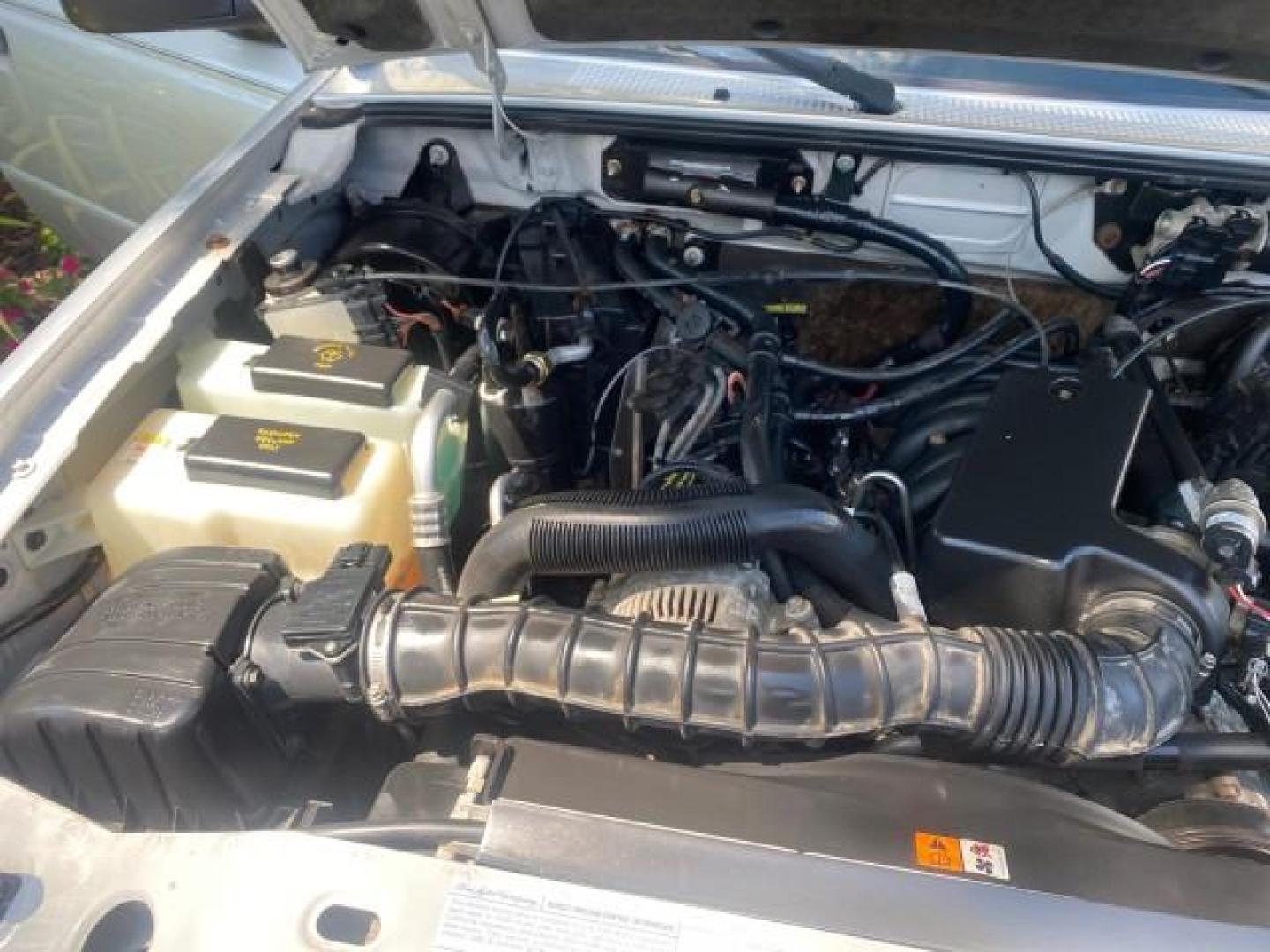 2003 Silver Frost Metallic /Dark Graphite Ford Ranger Edge Plus LOW MILES 57,781 X CAB (1FTYR44V93P) with an 3.0L SEFI Flex-Fuel FFV V6 Engine engine, Automatic transmission, located at 4701 North Dixie Hwy, Pompano Beach, FL, 33064, (954) 422-2889, 26.240938, -80.123474 - OUR WEBPAGE FLORIDACARS1.COM HAS OVER 100 PHOTOS AND FREE CARFAX LINK 2003 Ford Ranger XLT 4 Door Extended Cab Pickup 3.0L V6 F Flex Fuel 23 MPG Rear Wheel Drive Features ABS Brakes Air Conditioning Alloy Wheels AM/FM Stereo Automatic Transmission Bed Liner CD Audio Cloth Seats Cruise Control Flex F - Photo#24