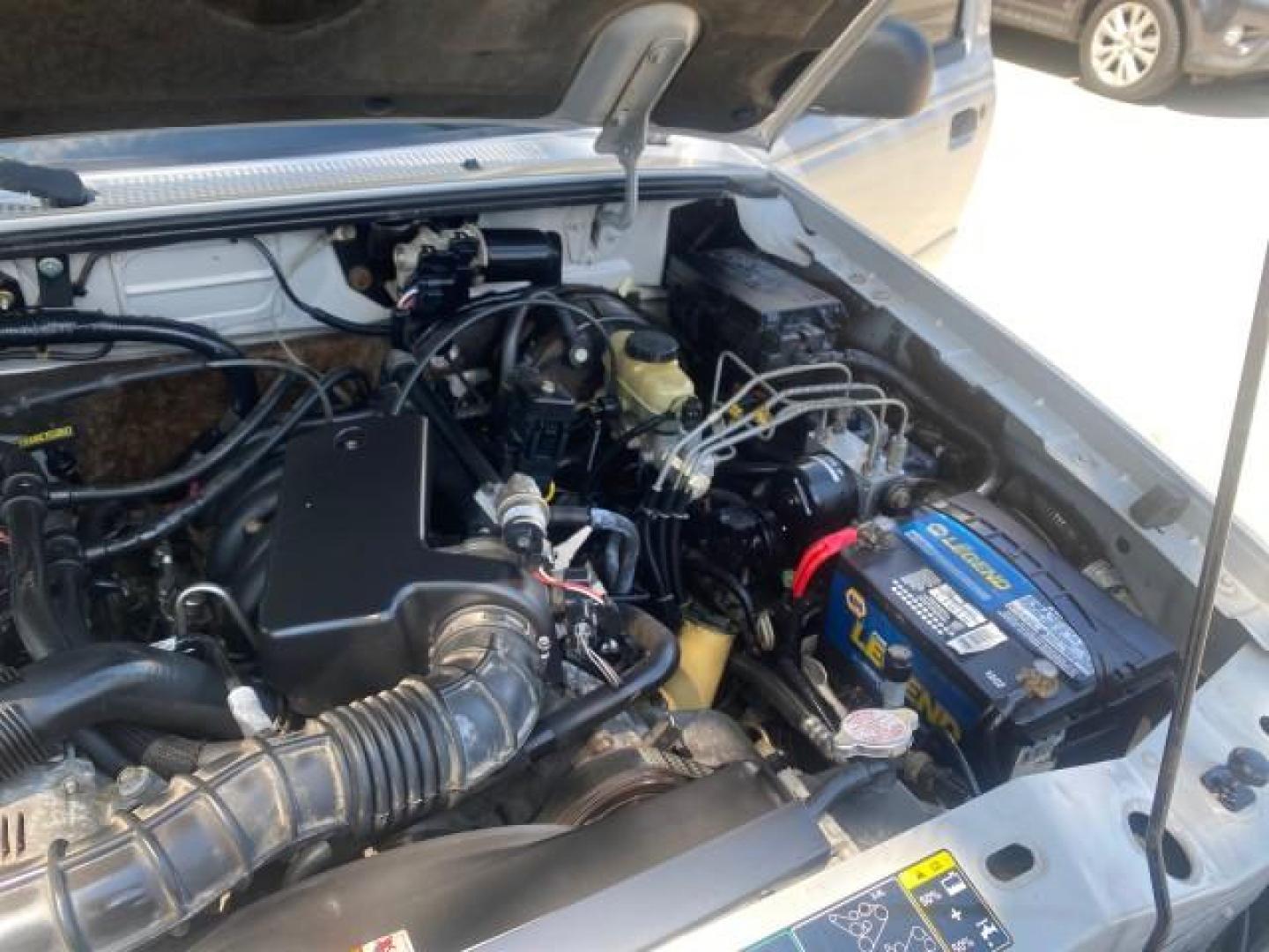 2003 Silver Frost Metallic /Dark Graphite Ford Ranger Edge Plus LOW MILES 57,781 X CAB (1FTYR44V93P) with an 3.0L SEFI Flex-Fuel FFV V6 Engine engine, Automatic transmission, located at 4701 North Dixie Hwy, Pompano Beach, FL, 33064, (954) 422-2889, 26.240938, -80.123474 - OUR WEBPAGE FLORIDACARS1.COM HAS OVER 100 PHOTOS AND FREE CARFAX LINK 2003 Ford Ranger XLT 4 Door Extended Cab Pickup 3.0L V6 F Flex Fuel 23 MPG Rear Wheel Drive Features ABS Brakes Air Conditioning Alloy Wheels AM/FM Stereo Automatic Transmission Bed Liner CD Audio Cloth Seats Cruise Control Flex F - Photo#25