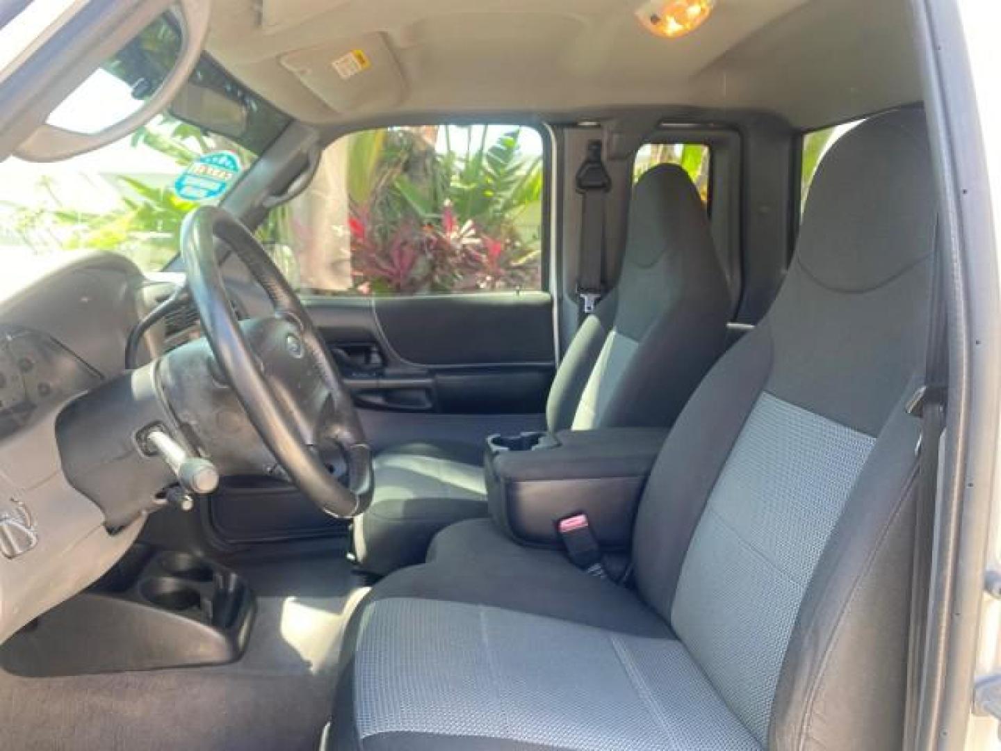 2003 Silver Frost Metallic /Dark Graphite Ford Ranger Edge Plus LOW MILES 57,781 X CAB (1FTYR44V93P) with an 3.0L SEFI Flex-Fuel FFV V6 Engine engine, Automatic transmission, located at 4701 North Dixie Hwy, Pompano Beach, FL, 33064, (954) 422-2889, 26.240938, -80.123474 - OUR WEBPAGE FLORIDACARS1.COM HAS OVER 100 PHOTOS AND FREE CARFAX LINK 2003 Ford Ranger XLT 4 Door Extended Cab Pickup 3.0L V6 F Flex Fuel 23 MPG Rear Wheel Drive Features ABS Brakes Air Conditioning Alloy Wheels AM/FM Stereo Automatic Transmission Bed Liner CD Audio Cloth Seats Cruise Control Flex F - Photo#44