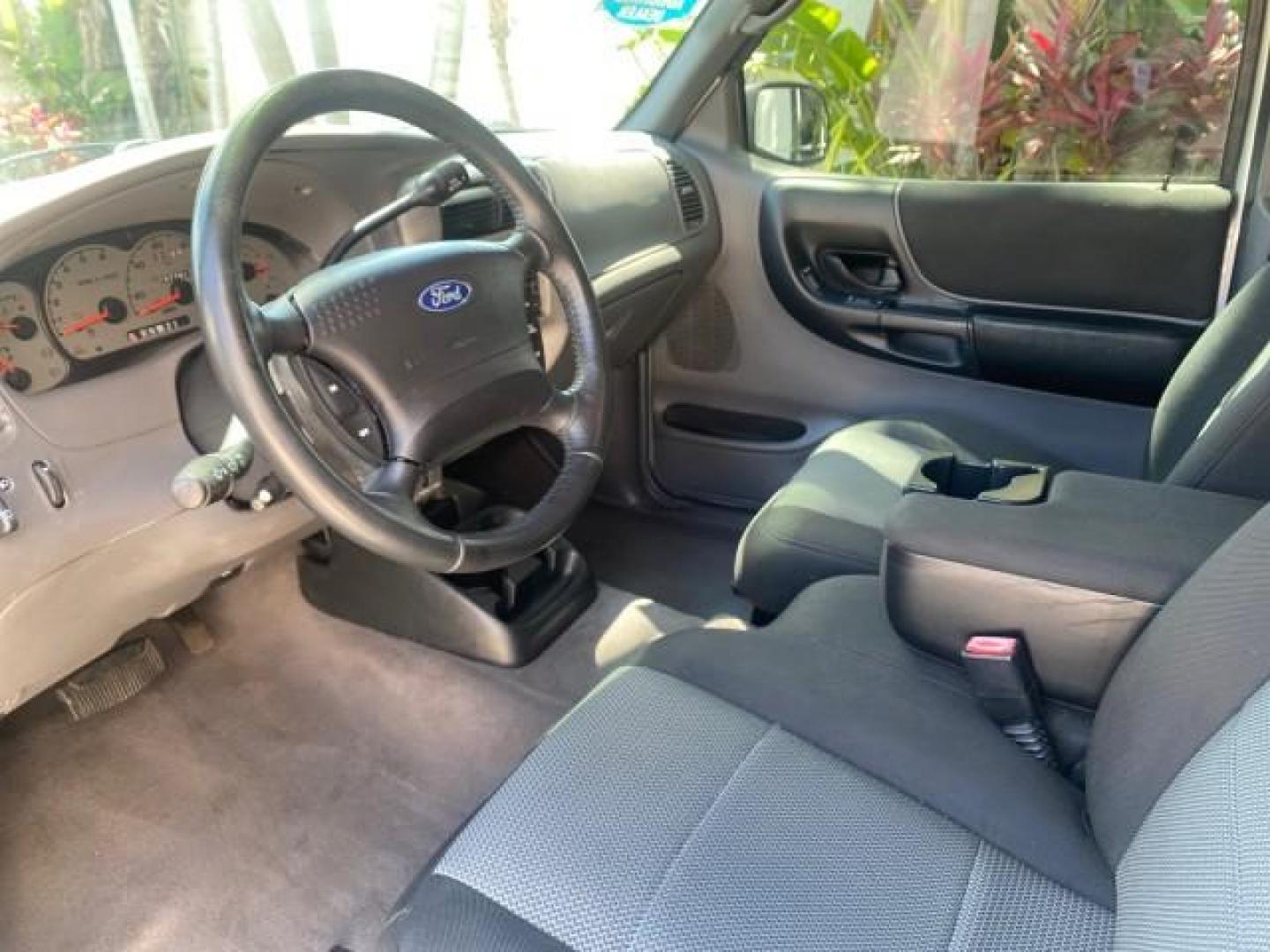 2003 Silver Frost Metallic /Dark Graphite Ford Ranger Edge Plus LOW MILES 57,781 X CAB (1FTYR44V93P) with an 3.0L SEFI Flex-Fuel FFV V6 Engine engine, Automatic transmission, located at 4701 North Dixie Hwy, Pompano Beach, FL, 33064, (954) 422-2889, 26.240938, -80.123474 - OUR WEBPAGE FLORIDACARS1.COM HAS OVER 100 PHOTOS AND FREE CARFAX LINK 2003 Ford Ranger XLT 4 Door Extended Cab Pickup 3.0L V6 F Flex Fuel 23 MPG Rear Wheel Drive Features ABS Brakes Air Conditioning Alloy Wheels AM/FM Stereo Automatic Transmission Bed Liner CD Audio Cloth Seats Cruise Control Flex F - Photo#46