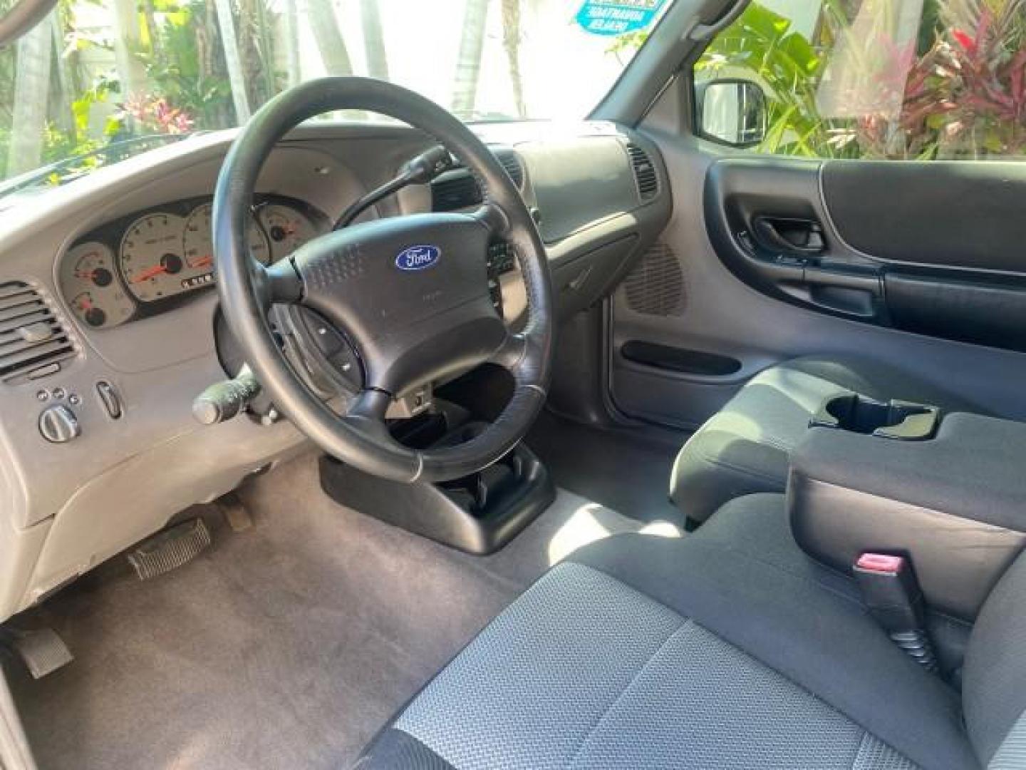 2003 Silver Frost Metallic /Dark Graphite Ford Ranger Edge Plus LOW MILES 57,781 X CAB (1FTYR44V93P) with an 3.0L SEFI Flex-Fuel FFV V6 Engine engine, Automatic transmission, located at 4701 North Dixie Hwy, Pompano Beach, FL, 33064, (954) 422-2889, 26.240938, -80.123474 - OUR WEBPAGE FLORIDACARS1.COM HAS OVER 100 PHOTOS AND FREE CARFAX LINK 2003 Ford Ranger XLT 4 Door Extended Cab Pickup 3.0L V6 F Flex Fuel 23 MPG Rear Wheel Drive Features ABS Brakes Air Conditioning Alloy Wheels AM/FM Stereo Automatic Transmission Bed Liner CD Audio Cloth Seats Cruise Control Flex F - Photo#47