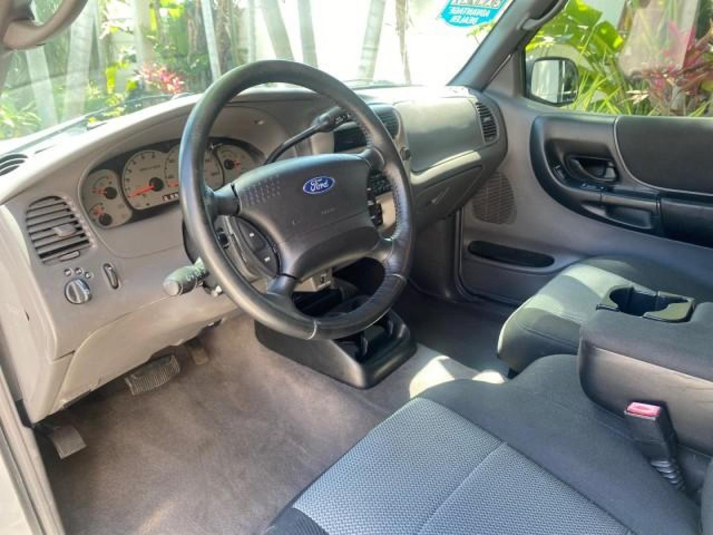 2003 Silver Frost Metallic /Dark Graphite Ford Ranger Edge Plus LOW MILES 57,781 X CAB (1FTYR44V93P) with an 3.0L SEFI Flex-Fuel FFV V6 Engine engine, Automatic transmission, located at 4701 North Dixie Hwy, Pompano Beach, FL, 33064, (954) 422-2889, 26.240938, -80.123474 - OUR WEBPAGE FLORIDACARS1.COM HAS OVER 100 PHOTOS AND FREE CARFAX LINK 2003 Ford Ranger XLT 4 Door Extended Cab Pickup 3.0L V6 F Flex Fuel 23 MPG Rear Wheel Drive Features ABS Brakes Air Conditioning Alloy Wheels AM/FM Stereo Automatic Transmission Bed Liner CD Audio Cloth Seats Cruise Control Flex F - Photo#48