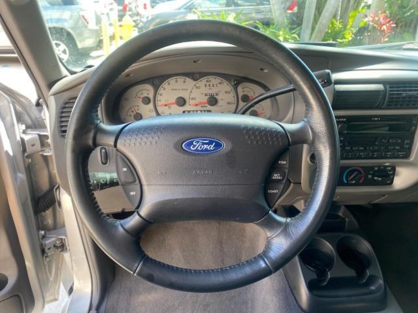 2003 Silver Frost Metallic /Dark Graphite Ford Ranger Edge Plus LOW MILES 57,781 X CAB (1FTYR44V93P) with an 3.0L SEFI Flex-Fuel FFV V6 Engine engine, Automatic transmission, located at 4701 North Dixie Hwy, Pompano Beach, FL, 33064, (954) 422-2889, 26.240938, -80.123474 - OUR WEBPAGE FLORIDACARS1.COM HAS OVER 100 PHOTOS AND FREE CARFAX LINK 2003 Ford Ranger XLT 4 Door Extended Cab Pickup 3.0L V6 F Flex Fuel 23 MPG Rear Wheel Drive Features ABS Brakes Air Conditioning Alloy Wheels AM/FM Stereo Automatic Transmission Bed Liner CD Audio Cloth Seats Cruise Control Flex F - Photo#49