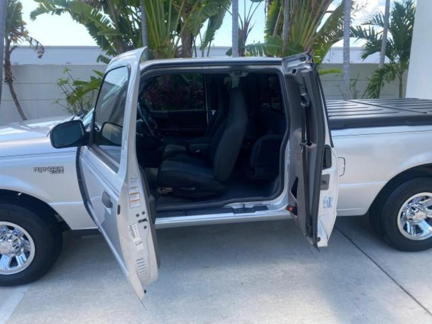 2003 Silver Frost Metallic /Dark Graphite Ford Ranger Edge Plus LOW MILES 57,781 X CAB (1FTYR44V93P) with an 3.0L SEFI Flex-Fuel FFV V6 Engine engine, Automatic transmission, located at 4701 North Dixie Hwy, Pompano Beach, FL, 33064, (954) 422-2889, 26.240938, -80.123474 - OUR WEBPAGE FLORIDACARS1.COM HAS OVER 100 PHOTOS AND FREE CARFAX LINK 2003 Ford Ranger XLT 4 Door Extended Cab Pickup 3.0L V6 F Flex Fuel 23 MPG Rear Wheel Drive Features ABS Brakes Air Conditioning Alloy Wheels AM/FM Stereo Automatic Transmission Bed Liner CD Audio Cloth Seats Cruise Control Flex F - Photo#70