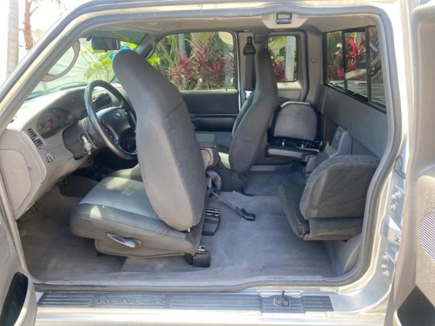 2003 Silver Frost Metallic /Dark Graphite Ford Ranger Edge Plus LOW MILES 57,781 X CAB (1FTYR44V93P) with an 3.0L SEFI Flex-Fuel FFV V6 Engine engine, Automatic transmission, located at 4701 North Dixie Hwy, Pompano Beach, FL, 33064, (954) 422-2889, 26.240938, -80.123474 - OUR WEBPAGE FLORIDACARS1.COM HAS OVER 100 PHOTOS AND FREE CARFAX LINK 2003 Ford Ranger XLT 4 Door Extended Cab Pickup 3.0L V6 F Flex Fuel 23 MPG Rear Wheel Drive Features ABS Brakes Air Conditioning Alloy Wheels AM/FM Stereo Automatic Transmission Bed Liner CD Audio Cloth Seats Cruise Control Flex F - Photo#71