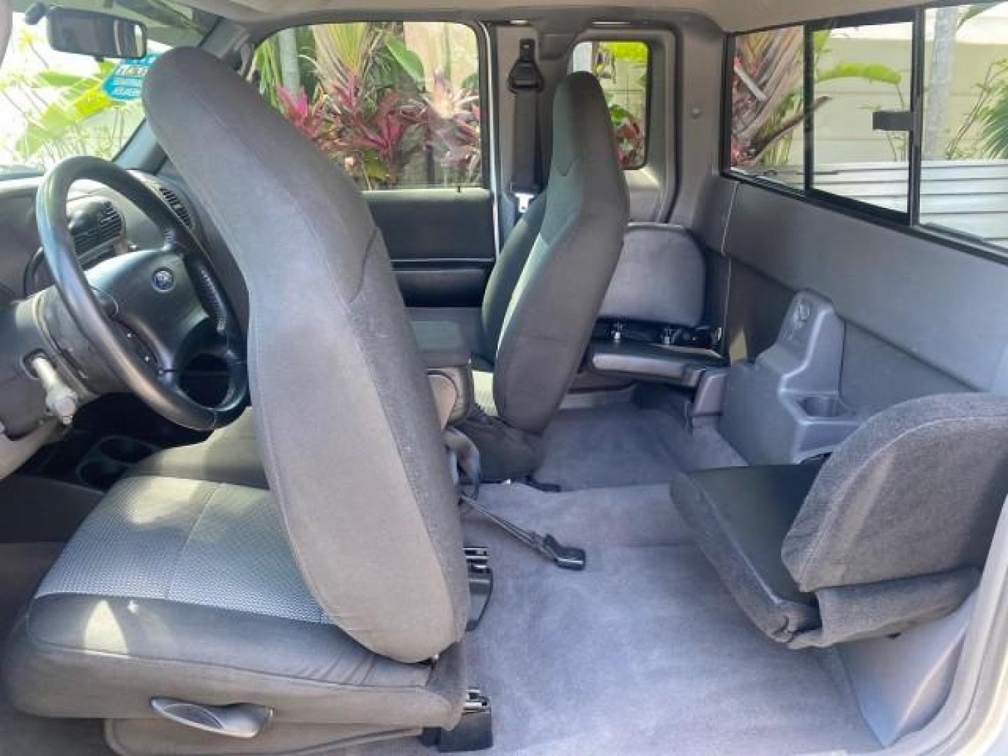 2003 Silver Frost Metallic /Dark Graphite Ford Ranger Edge Plus LOW MILES 57,781 X CAB (1FTYR44V93P) with an 3.0L SEFI Flex-Fuel FFV V6 Engine engine, Automatic transmission, located at 4701 North Dixie Hwy, Pompano Beach, FL, 33064, (954) 422-2889, 26.240938, -80.123474 - OUR WEBPAGE FLORIDACARS1.COM HAS OVER 100 PHOTOS AND FREE CARFAX LINK 2003 Ford Ranger XLT 4 Door Extended Cab Pickup 3.0L V6 F Flex Fuel 23 MPG Rear Wheel Drive Features ABS Brakes Air Conditioning Alloy Wheels AM/FM Stereo Automatic Transmission Bed Liner CD Audio Cloth Seats Cruise Control Flex F - Photo#72