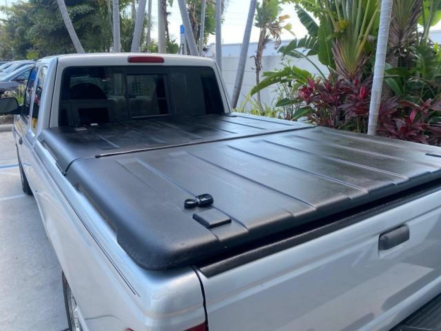 2003 Silver Frost Metallic /Dark Graphite Ford Ranger Edge Plus LOW MILES 57,781 X CAB (1FTYR44V93P) with an 3.0L SEFI Flex-Fuel FFV V6 Engine engine, Automatic transmission, located at 4701 North Dixie Hwy, Pompano Beach, FL, 33064, (954) 422-2889, 26.240938, -80.123474 - OUR WEBPAGE FLORIDACARS1.COM HAS OVER 100 PHOTOS AND FREE CARFAX LINK 2003 Ford Ranger XLT 4 Door Extended Cab Pickup 3.0L V6 F Flex Fuel 23 MPG Rear Wheel Drive Features ABS Brakes Air Conditioning Alloy Wheels AM/FM Stereo Automatic Transmission Bed Liner CD Audio Cloth Seats Cruise Control Flex F - Photo#83