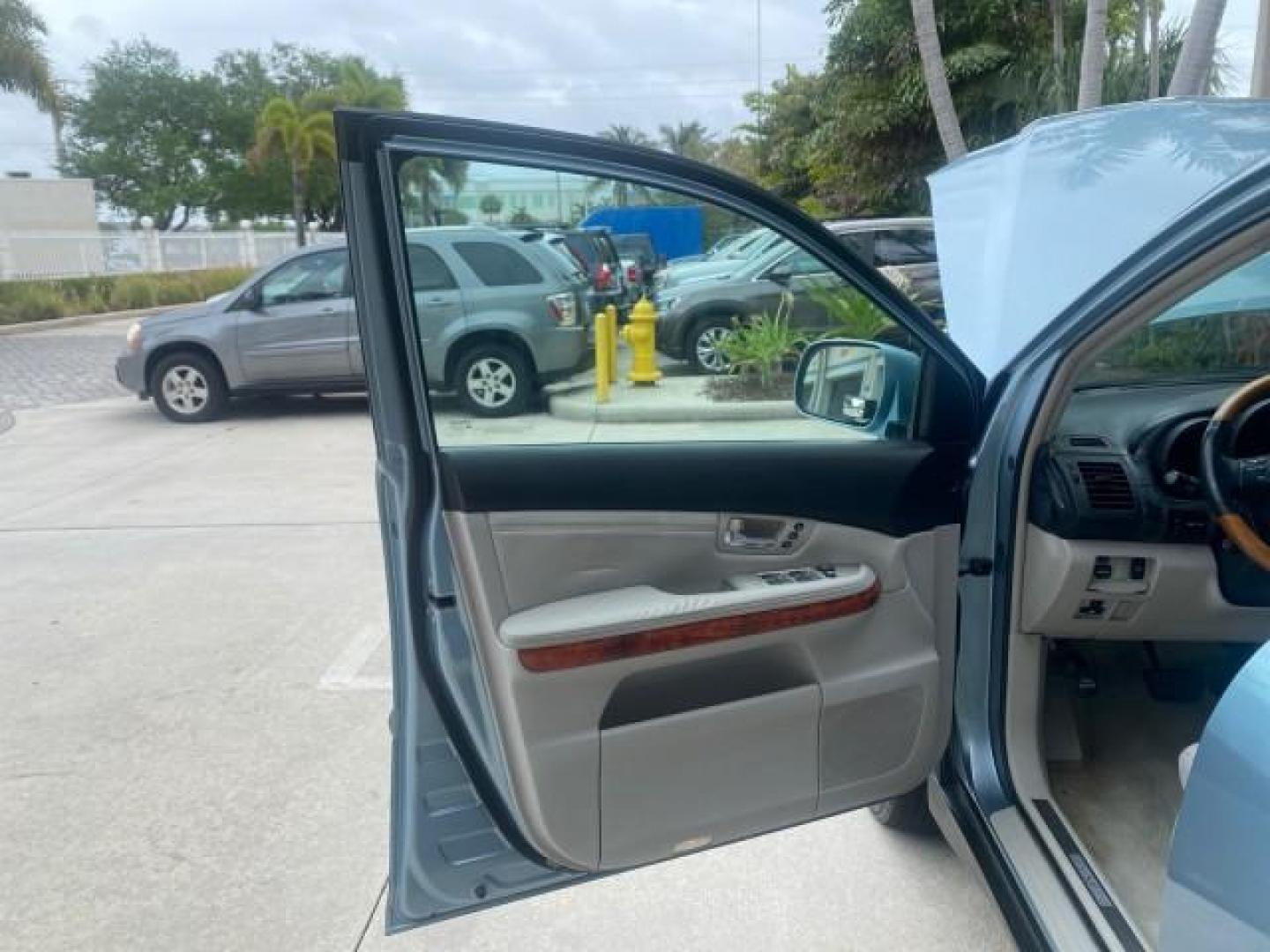 2005 Breakwater Blue Metallic /Light Gray Lexus RX 330 LOW MILES 68,645 1 OWNER (2T2GA31U55C) with an 3.3L DOHC MPI 24-Valve V6 Engine engine, Automatic transmission, located at 4701 North Dixie Hwy, Pompano Beach, FL, 33064, (954) 422-2889, 26.240938, -80.123474 - OUR WEBPAGE FLORIDACARS1.COM HAS OVER 100 PHOTOS AND FREE CARFAX LINK 2005 Lexus RX 330 1 OWNER 4 Door Wagon/Sport Utility 3.3L V6 F 24V Gasoline 26 MPG Front Wheel Drive Features ABS Brakes Air Conditioning Alloy Wheels AM/FM Stereo Automatic Transmission Cassette Player CD Audio Cruise Control Fro - Photo#9