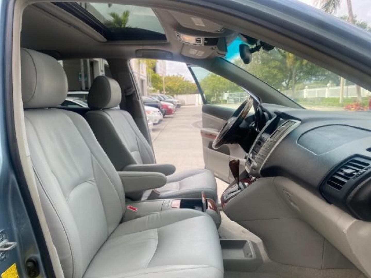 2005 Breakwater Blue Metallic /Light Gray Lexus RX 330 LOW MILES 68,645 1 OWNER (2T2GA31U55C) with an 3.3L DOHC MPI 24-Valve V6 Engine engine, Automatic transmission, located at 4701 North Dixie Hwy, Pompano Beach, FL, 33064, (954) 422-2889, 26.240938, -80.123474 - OUR WEBPAGE FLORIDACARS1.COM HAS OVER 100 PHOTOS AND FREE CARFAX LINK 2005 Lexus RX 330 1 OWNER 4 Door Wagon/Sport Utility 3.3L V6 F 24V Gasoline 26 MPG Front Wheel Drive Features ABS Brakes Air Conditioning Alloy Wheels AM/FM Stereo Automatic Transmission Cassette Player CD Audio Cruise Control Fro - Photo#12