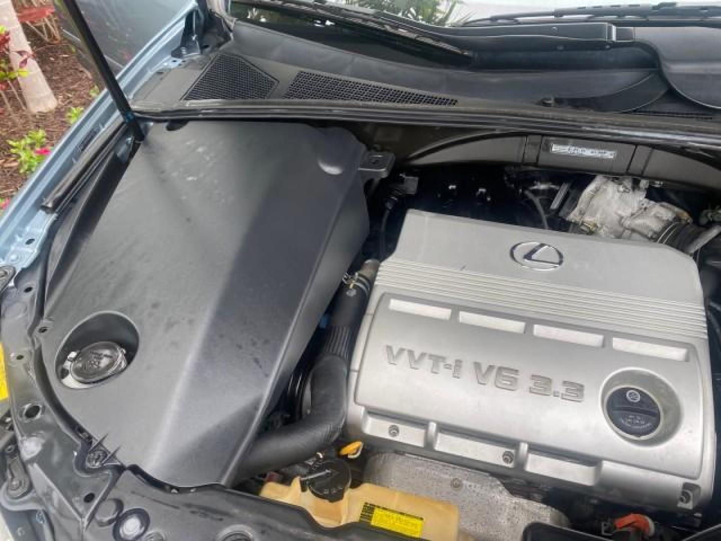 2005 Breakwater Blue Metallic /Light Gray Lexus RX 330 LOW MILES 68,645 1 OWNER (2T2GA31U55C) with an 3.3L DOHC MPI 24-Valve V6 Engine engine, Automatic transmission, located at 4701 North Dixie Hwy, Pompano Beach, FL, 33064, (954) 422-2889, 26.240938, -80.123474 - OUR WEBPAGE FLORIDACARS1.COM HAS OVER 100 PHOTOS AND FREE CARFAX LINK 2005 Lexus RX 330 1 OWNER 4 Door Wagon/Sport Utility 3.3L V6 F 24V Gasoline 26 MPG Front Wheel Drive Features ABS Brakes Air Conditioning Alloy Wheels AM/FM Stereo Automatic Transmission Cassette Player CD Audio Cruise Control Fro - Photo#24