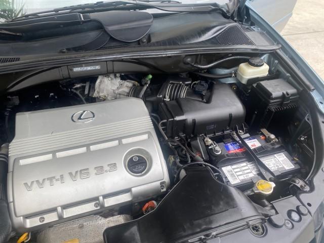 2005 Breakwater Blue Metallic /Light Gray Lexus RX 330 LOW MILES 68,645 1 OWNER (2T2GA31U55C) with an 3.3L DOHC MPI 24-Valve V6 Engine engine, Automatic transmission, located at 4701 North Dixie Hwy, Pompano Beach, FL, 33064, (954) 422-2889, 26.240938, -80.123474 - OUR WEBPAGE FLORIDACARS1.COM HAS OVER 100 PHOTOS AND FREE CARFAX LINK 2005 Lexus RX 330 1 OWNER 4 Door Wagon/Sport Utility 3.3L V6 F 24V Gasoline 26 MPG Front Wheel Drive Features ABS Brakes Air Conditioning Alloy Wheels AM/FM Stereo Automatic Transmission Cassette Player CD Audio Cruise Control Fro - Photo#25