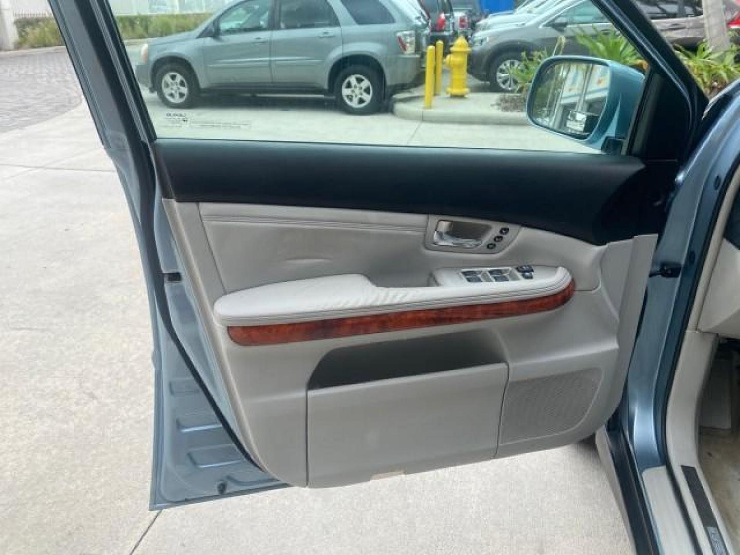 2005 Breakwater Blue Metallic /Light Gray Lexus RX 330 LOW MILES 68,645 1 OWNER (2T2GA31U55C) with an 3.3L DOHC MPI 24-Valve V6 Engine engine, Automatic transmission, located at 4701 North Dixie Hwy, Pompano Beach, FL, 33064, (954) 422-2889, 26.240938, -80.123474 - OUR WEBPAGE FLORIDACARS1.COM HAS OVER 100 PHOTOS AND FREE CARFAX LINK 2005 Lexus RX 330 1 OWNER 4 Door Wagon/Sport Utility 3.3L V6 F 24V Gasoline 26 MPG Front Wheel Drive Features ABS Brakes Air Conditioning Alloy Wheels AM/FM Stereo Automatic Transmission Cassette Player CD Audio Cruise Control Fro - Photo#41