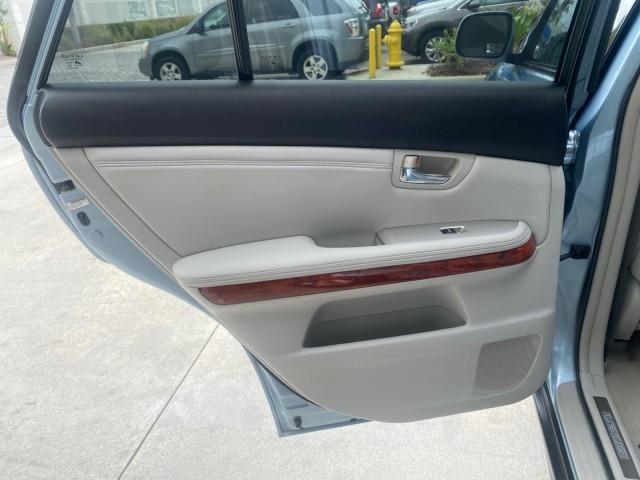 2005 Breakwater Blue Metallic /Light Gray Lexus RX 330 LOW MILES 68,645 1 OWNER (2T2GA31U55C) with an 3.3L DOHC MPI 24-Valve V6 Engine engine, Automatic transmission, located at 4701 North Dixie Hwy, Pompano Beach, FL, 33064, (954) 422-2889, 26.240938, -80.123474 - OUR WEBPAGE FLORIDACARS1.COM HAS OVER 100 PHOTOS AND FREE CARFAX LINK 2005 Lexus RX 330 1 OWNER 4 Door Wagon/Sport Utility 3.3L V6 F 24V Gasoline 26 MPG Front Wheel Drive Features ABS Brakes Air Conditioning Alloy Wheels AM/FM Stereo Automatic Transmission Cassette Player CD Audio Cruise Control Fro - Photo#79