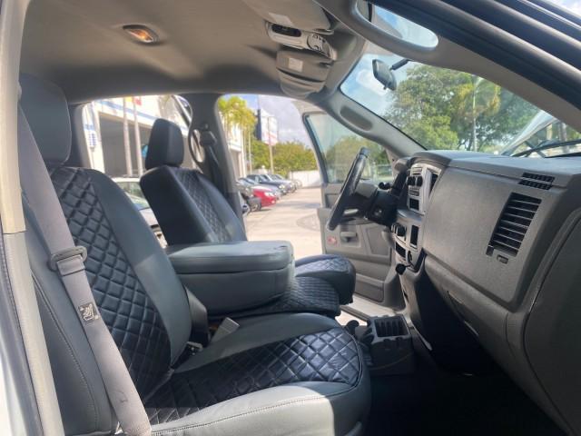 2007 Bright White /Medium Slate Gray Dodge Ram 1500 SLT CREW CAB CAMPER TOP 5.7 V8 (1D7HA182X7S) with an 5.7L V8 Hemi Multi-Displacement Engine engine, Automatic transmission, located at 4701 North Dixie Hwy, Pompano Beach, FL, 33064, (954) 422-2889, 26.240938, -80.123474 - OUR WEBPAGE FLORIDACARS1.COM HAS OVER 100 PHOTOS AND FREE CARFAX LINK 2007 Dodge Ram 1500 SLT 8 FT CREW CAB FIBER GLASS CAMPER TOP 4 Door Extended Cab Pickup 5.7L V8 F 16V Gasoline 19 MPG Rear Wheel Drive Features 20 Inch Plus Wheels ABS Brakes Air Conditioning Alloy Wheels AM/FM Stereo Automatic Tr - Photo#12