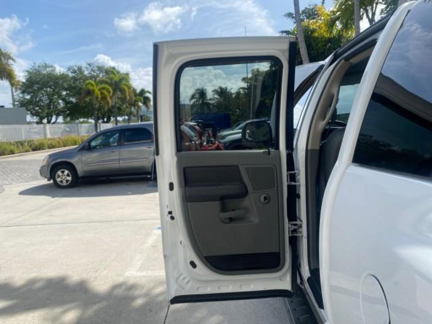 2007 Bright White /Medium Slate Gray Dodge Ram 1500 SLT CREW CAB CAMPER TOP 5.7 V8 (1D7HA182X7S) with an 5.7L V8 Hemi Multi-Displacement Engine engine, Automatic transmission, located at 4701 North Dixie Hwy, Pompano Beach, FL, 33064, (954) 422-2889, 26.240938, -80.123474 - OUR WEBPAGE FLORIDACARS1.COM HAS OVER 100 PHOTOS AND FREE CARFAX LINK 2007 Dodge Ram 1500 SLT 8 FT CREW CAB FIBER GLASS CAMPER TOP 4 Door Extended Cab Pickup 5.7L V8 F 16V Gasoline 19 MPG Rear Wheel Drive Features 20 Inch Plus Wheels ABS Brakes Air Conditioning Alloy Wheels AM/FM Stereo Automatic Tr- Photo#13