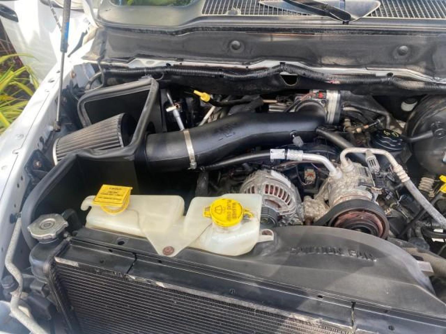 2007 Bright White /Medium Slate Gray Dodge Ram 1500 SLT CREW CAB CAMPER TOP 5.7 V8 (1D7HA182X7S) with an 5.7L V8 Hemi Multi-Displacement Engine engine, Automatic transmission, located at 4701 North Dixie Hwy, Pompano Beach, FL, 33064, (954) 422-2889, 26.240938, -80.123474 - OUR WEBPAGE FLORIDACARS1.COM HAS OVER 100 PHOTOS AND FREE CARFAX LINK 2007 Dodge Ram 1500 SLT 8 FT CREW CAB FIBER GLASS CAMPER TOP 4 Door Extended Cab Pickup 5.7L V8 F 16V Gasoline 19 MPG Rear Wheel Drive Features 20 Inch Plus Wheels ABS Brakes Air Conditioning Alloy Wheels AM/FM Stereo Automatic Tr- Photo#23