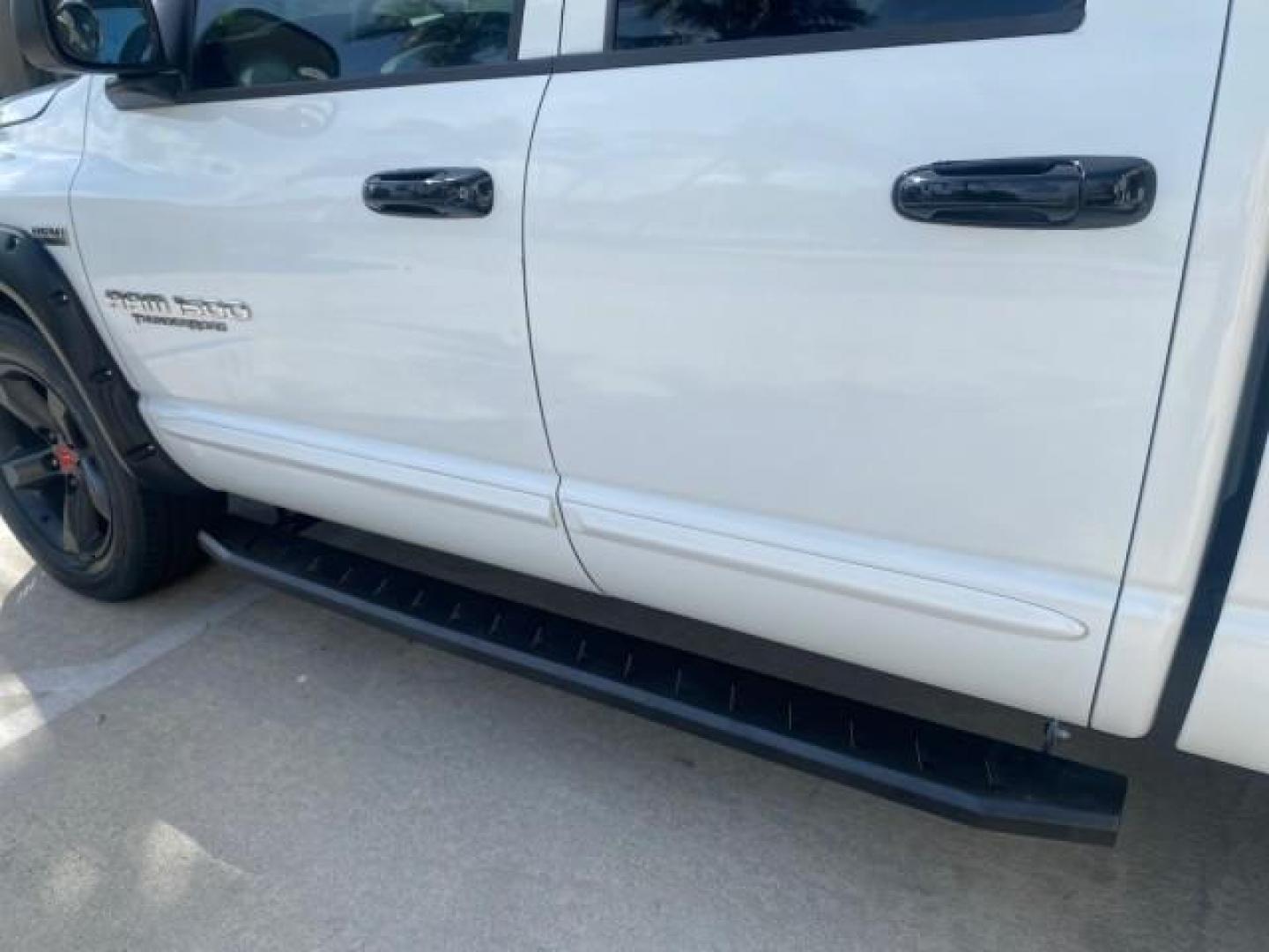2007 Bright White /Medium Slate Gray Dodge Ram 1500 SLT CREW CAB CAMPER TOP 5.7 V8 (1D7HA182X7S) with an 5.7L V8 Hemi Multi-Displacement Engine engine, Automatic transmission, located at 4701 North Dixie Hwy, Pompano Beach, FL, 33064, (954) 422-2889, 26.240938, -80.123474 - OUR WEBPAGE FLORIDACARS1.COM HAS OVER 100 PHOTOS AND FREE CARFAX LINK 2007 Dodge Ram 1500 SLT 8 FT CREW CAB FIBER GLASS CAMPER TOP 4 Door Extended Cab Pickup 5.7L V8 F 16V Gasoline 19 MPG Rear Wheel Drive Features 20 Inch Plus Wheels ABS Brakes Air Conditioning Alloy Wheels AM/FM Stereo Automatic Tr- Photo#41