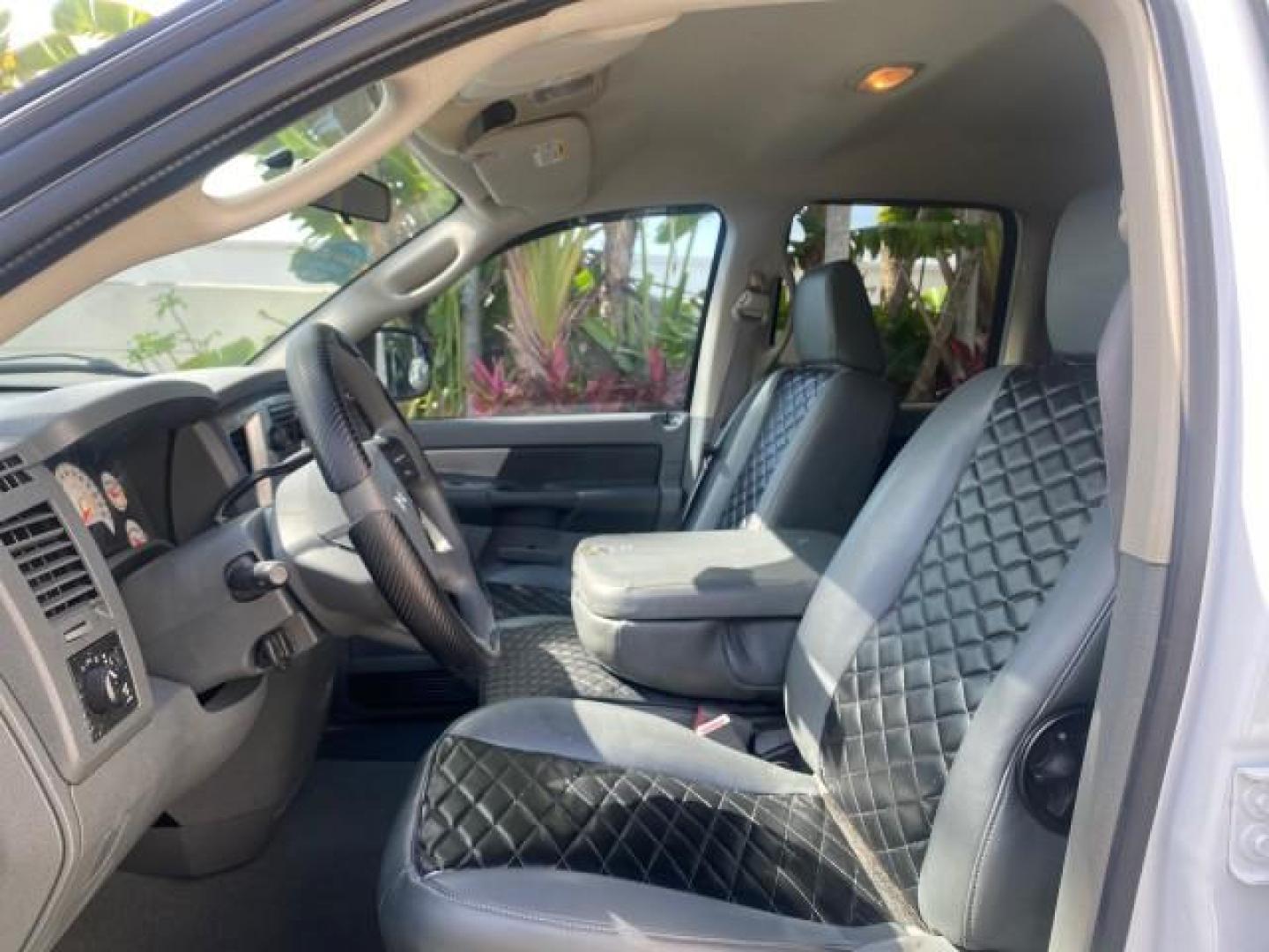 2007 Bright White /Medium Slate Gray Dodge Ram 1500 SLT CREW CAB CAMPER TOP 5.7 V8 (1D7HA182X7S) with an 5.7L V8 Hemi Multi-Displacement Engine engine, Automatic transmission, located at 4701 North Dixie Hwy, Pompano Beach, FL, 33064, (954) 422-2889, 26.240938, -80.123474 - OUR WEBPAGE FLORIDACARS1.COM HAS OVER 100 PHOTOS AND FREE CARFAX LINK 2007 Dodge Ram 1500 SLT 8 FT CREW CAB FIBER GLASS CAMPER TOP 4 Door Extended Cab Pickup 5.7L V8 F 16V Gasoline 19 MPG Rear Wheel Drive Features 20 Inch Plus Wheels ABS Brakes Air Conditioning Alloy Wheels AM/FM Stereo Automatic Tr- Photo#44