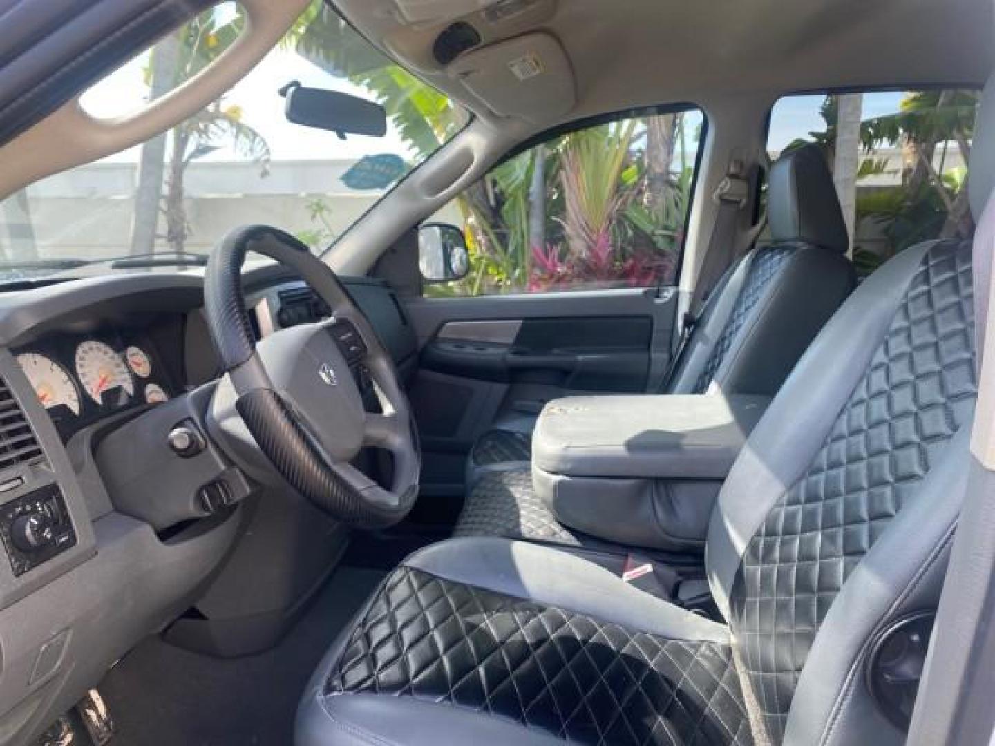2007 Bright White /Medium Slate Gray Dodge Ram 1500 SLT CREW CAB CAMPER TOP 5.7 V8 (1D7HA182X7S) with an 5.7L V8 Hemi Multi-Displacement Engine engine, Automatic transmission, located at 4701 North Dixie Hwy, Pompano Beach, FL, 33064, (954) 422-2889, 26.240938, -80.123474 - OUR WEBPAGE FLORIDACARS1.COM HAS OVER 100 PHOTOS AND FREE CARFAX LINK 2007 Dodge Ram 1500 SLT 8 FT CREW CAB FIBER GLASS CAMPER TOP 4 Door Extended Cab Pickup 5.7L V8 F 16V Gasoline 19 MPG Rear Wheel Drive Features 20 Inch Plus Wheels ABS Brakes Air Conditioning Alloy Wheels AM/FM Stereo Automatic Tr- Photo#45