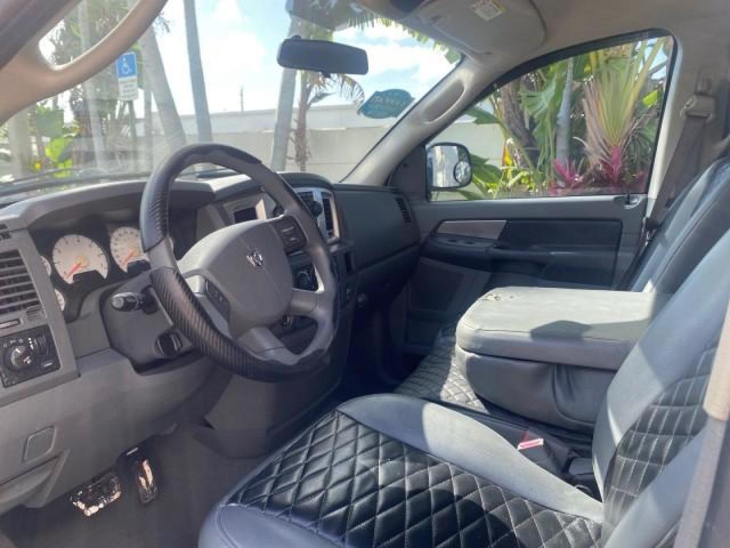 2007 Bright White /Medium Slate Gray Dodge Ram 1500 SLT CREW CAB CAMPER TOP 5.7 V8 (1D7HA182X7S) with an 5.7L V8 Hemi Multi-Displacement Engine engine, Automatic transmission, located at 4701 North Dixie Hwy, Pompano Beach, FL, 33064, (954) 422-2889, 26.240938, -80.123474 - OUR WEBPAGE FLORIDACARS1.COM HAS OVER 100 PHOTOS AND FREE CARFAX LINK 2007 Dodge Ram 1500 SLT 8 FT CREW CAB FIBER GLASS CAMPER TOP 4 Door Extended Cab Pickup 5.7L V8 F 16V Gasoline 19 MPG Rear Wheel Drive Features 20 Inch Plus Wheels ABS Brakes Air Conditioning Alloy Wheels AM/FM Stereo Automatic Tr- Photo#46