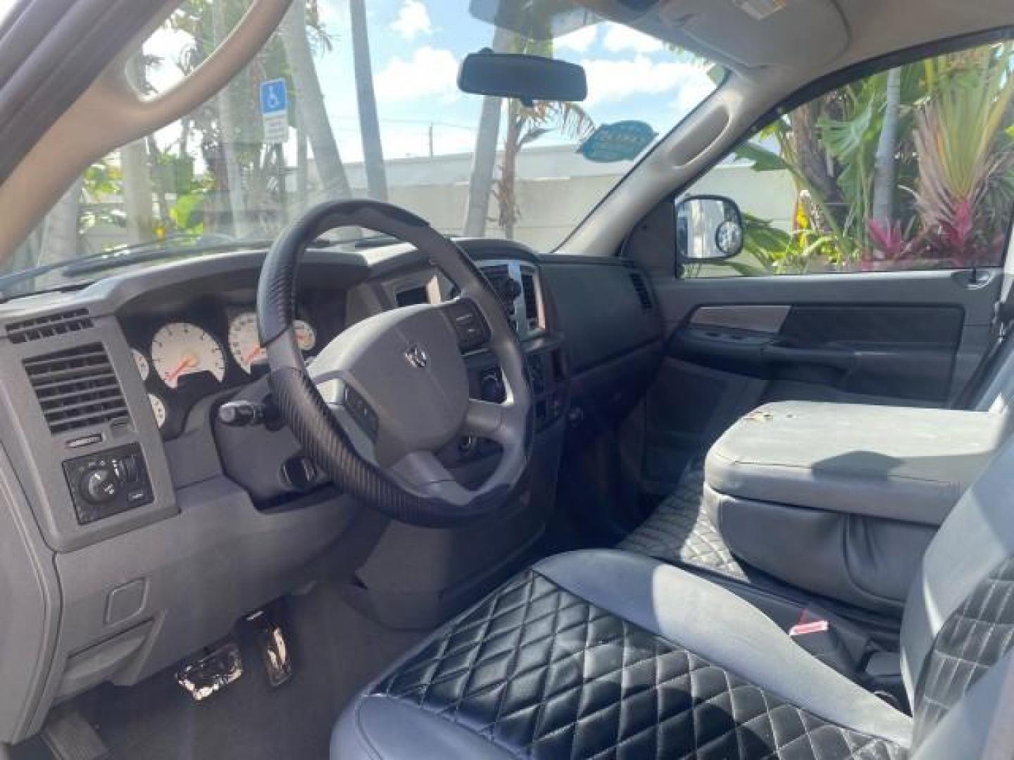 2007 Bright White /Medium Slate Gray Dodge Ram 1500 SLT CREW CAB CAMPER TOP 5.7 V8 (1D7HA182X7S) with an 5.7L V8 Hemi Multi-Displacement Engine engine, Automatic transmission, located at 4701 North Dixie Hwy, Pompano Beach, FL, 33064, (954) 422-2889, 26.240938, -80.123474 - OUR WEBPAGE FLORIDACARS1.COM HAS OVER 100 PHOTOS AND FREE CARFAX LINK 2007 Dodge Ram 1500 SLT 8 FT CREW CAB FIBER GLASS CAMPER TOP 4 Door Extended Cab Pickup 5.7L V8 F 16V Gasoline 19 MPG Rear Wheel Drive Features 20 Inch Plus Wheels ABS Brakes Air Conditioning Alloy Wheels AM/FM Stereo Automatic Tr- Photo#47