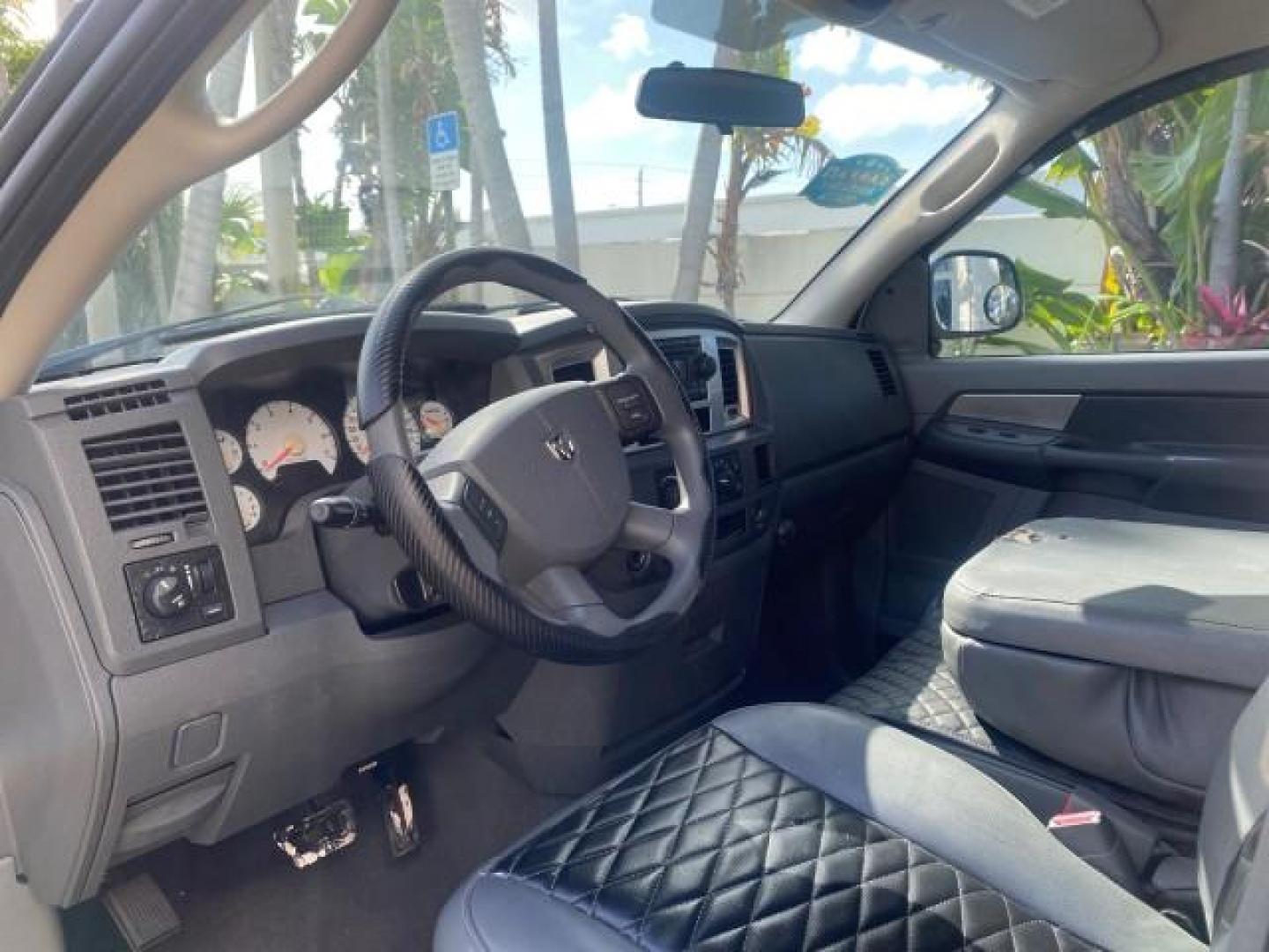 2007 Bright White /Medium Slate Gray Dodge Ram 1500 SLT CREW CAB CAMPER TOP 5.7 V8 (1D7HA182X7S) with an 5.7L V8 Hemi Multi-Displacement Engine engine, Automatic transmission, located at 4701 North Dixie Hwy, Pompano Beach, FL, 33064, (954) 422-2889, 26.240938, -80.123474 - OUR WEBPAGE FLORIDACARS1.COM HAS OVER 100 PHOTOS AND FREE CARFAX LINK 2007 Dodge Ram 1500 SLT 8 FT CREW CAB FIBER GLASS CAMPER TOP 4 Door Extended Cab Pickup 5.7L V8 F 16V Gasoline 19 MPG Rear Wheel Drive Features 20 Inch Plus Wheels ABS Brakes Air Conditioning Alloy Wheels AM/FM Stereo Automatic Tr- Photo#48