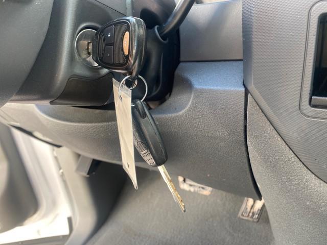 2007 Bright White /Medium Slate Gray Dodge Ram 1500 SLT CREW CAB CAMPER TOP 5.7 V8 (1D7HA182X7S) with an 5.7L V8 Hemi Multi-Displacement Engine engine, Automatic transmission, located at 4701 North Dixie Hwy, Pompano Beach, FL, 33064, (954) 422-2889, 26.240938, -80.123474 - OUR WEBPAGE FLORIDACARS1.COM HAS OVER 100 PHOTOS AND FREE CARFAX LINK 2007 Dodge Ram 1500 SLT 8 FT CREW CAB FIBER GLASS CAMPER TOP 4 Door Extended Cab Pickup 5.7L V8 F 16V Gasoline 19 MPG Rear Wheel Drive Features 20 Inch Plus Wheels ABS Brakes Air Conditioning Alloy Wheels AM/FM Stereo Automatic Tr - Photo#56