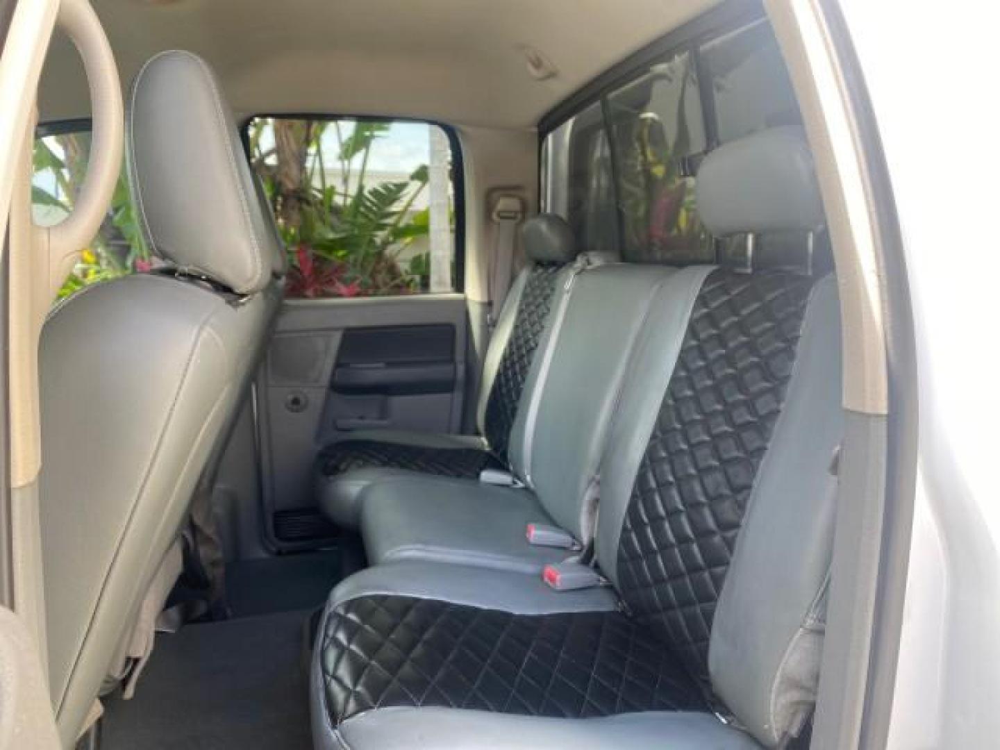 2007 Bright White /Medium Slate Gray Dodge Ram 1500 SLT CREW CAB CAMPER TOP 5.7 V8 (1D7HA182X7S) with an 5.7L V8 Hemi Multi-Displacement Engine engine, Automatic transmission, located at 4701 North Dixie Hwy, Pompano Beach, FL, 33064, (954) 422-2889, 26.240938, -80.123474 - OUR WEBPAGE FLORIDACARS1.COM HAS OVER 100 PHOTOS AND FREE CARFAX LINK 2007 Dodge Ram 1500 SLT 8 FT CREW CAB FIBER GLASS CAMPER TOP 4 Door Extended Cab Pickup 5.7L V8 F 16V Gasoline 19 MPG Rear Wheel Drive Features 20 Inch Plus Wheels ABS Brakes Air Conditioning Alloy Wheels AM/FM Stereo Automatic Tr- Photo#74