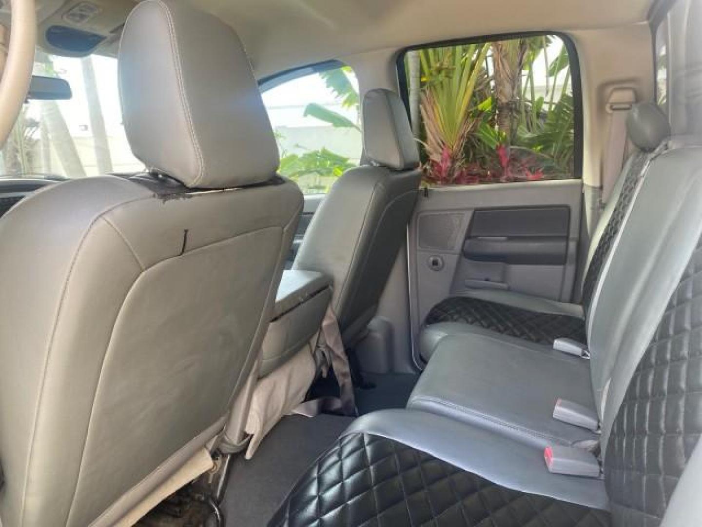 2007 Bright White /Medium Slate Gray Dodge Ram 1500 SLT CREW CAB CAMPER TOP 5.7 V8 (1D7HA182X7S) with an 5.7L V8 Hemi Multi-Displacement Engine engine, Automatic transmission, located at 4701 North Dixie Hwy, Pompano Beach, FL, 33064, (954) 422-2889, 26.240938, -80.123474 - OUR WEBPAGE FLORIDACARS1.COM HAS OVER 100 PHOTOS AND FREE CARFAX LINK 2007 Dodge Ram 1500 SLT 8 FT CREW CAB FIBER GLASS CAMPER TOP 4 Door Extended Cab Pickup 5.7L V8 F 16V Gasoline 19 MPG Rear Wheel Drive Features 20 Inch Plus Wheels ABS Brakes Air Conditioning Alloy Wheels AM/FM Stereo Automatic Tr- Photo#77