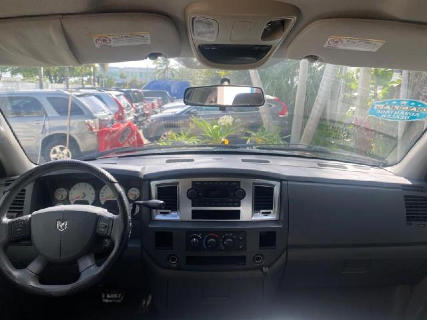 2007 Bright White /Medium Slate Gray Dodge Ram 1500 SLT CREW CAB CAMPER TOP 5.7 V8 (1D7HA182X7S) with an 5.7L V8 Hemi Multi-Displacement Engine engine, Automatic transmission, located at 4701 North Dixie Hwy, Pompano Beach, FL, 33064, (954) 422-2889, 26.240938, -80.123474 - OUR WEBPAGE FLORIDACARS1.COM HAS OVER 100 PHOTOS AND FREE CARFAX LINK 2007 Dodge Ram 1500 SLT 8 FT CREW CAB FIBER GLASS CAMPER TOP 4 Door Extended Cab Pickup 5.7L V8 F 16V Gasoline 19 MPG Rear Wheel Drive Features 20 Inch Plus Wheels ABS Brakes Air Conditioning Alloy Wheels AM/FM Stereo Automatic Tr- Photo#79