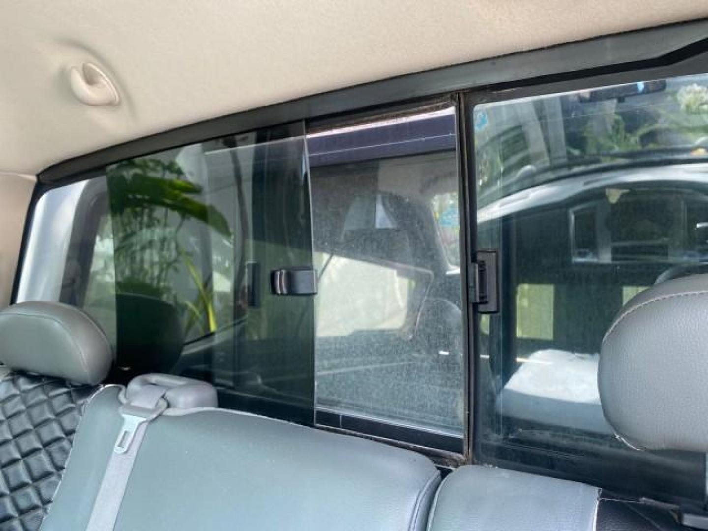 2007 Bright White /Medium Slate Gray Dodge Ram 1500 SLT CREW CAB CAMPER TOP 5.7 V8 (1D7HA182X7S) with an 5.7L V8 Hemi Multi-Displacement Engine engine, Automatic transmission, located at 4701 North Dixie Hwy, Pompano Beach, FL, 33064, (954) 422-2889, 26.240938, -80.123474 - OUR WEBPAGE FLORIDACARS1.COM HAS OVER 100 PHOTOS AND FREE CARFAX LINK 2007 Dodge Ram 1500 SLT 8 FT CREW CAB FIBER GLASS CAMPER TOP 4 Door Extended Cab Pickup 5.7L V8 F 16V Gasoline 19 MPG Rear Wheel Drive Features 20 Inch Plus Wheels ABS Brakes Air Conditioning Alloy Wheels AM/FM Stereo Automatic Tr- Photo#81